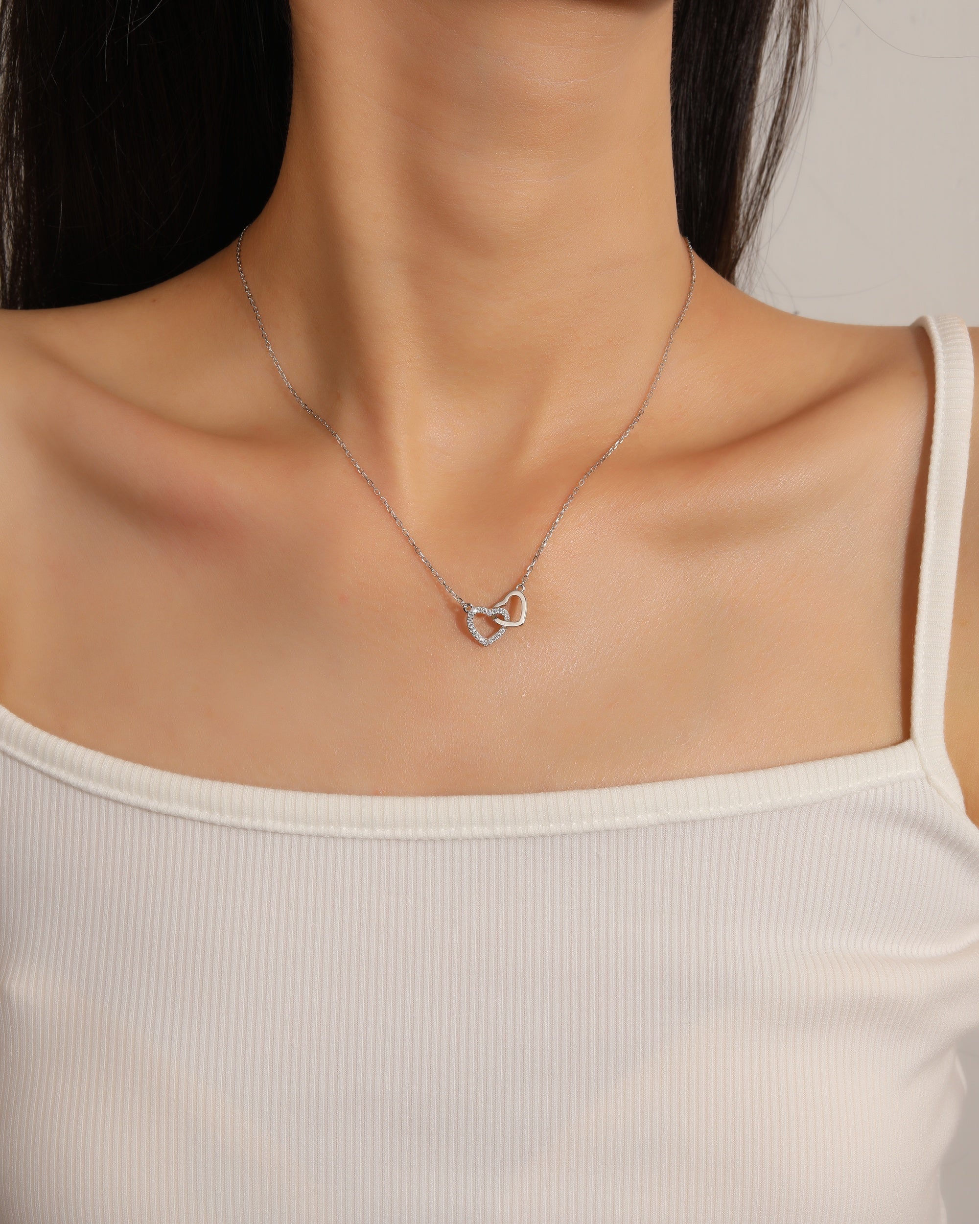 Collar de corazones entrelazados liso y circonias blanca 45+5cm en rodizado