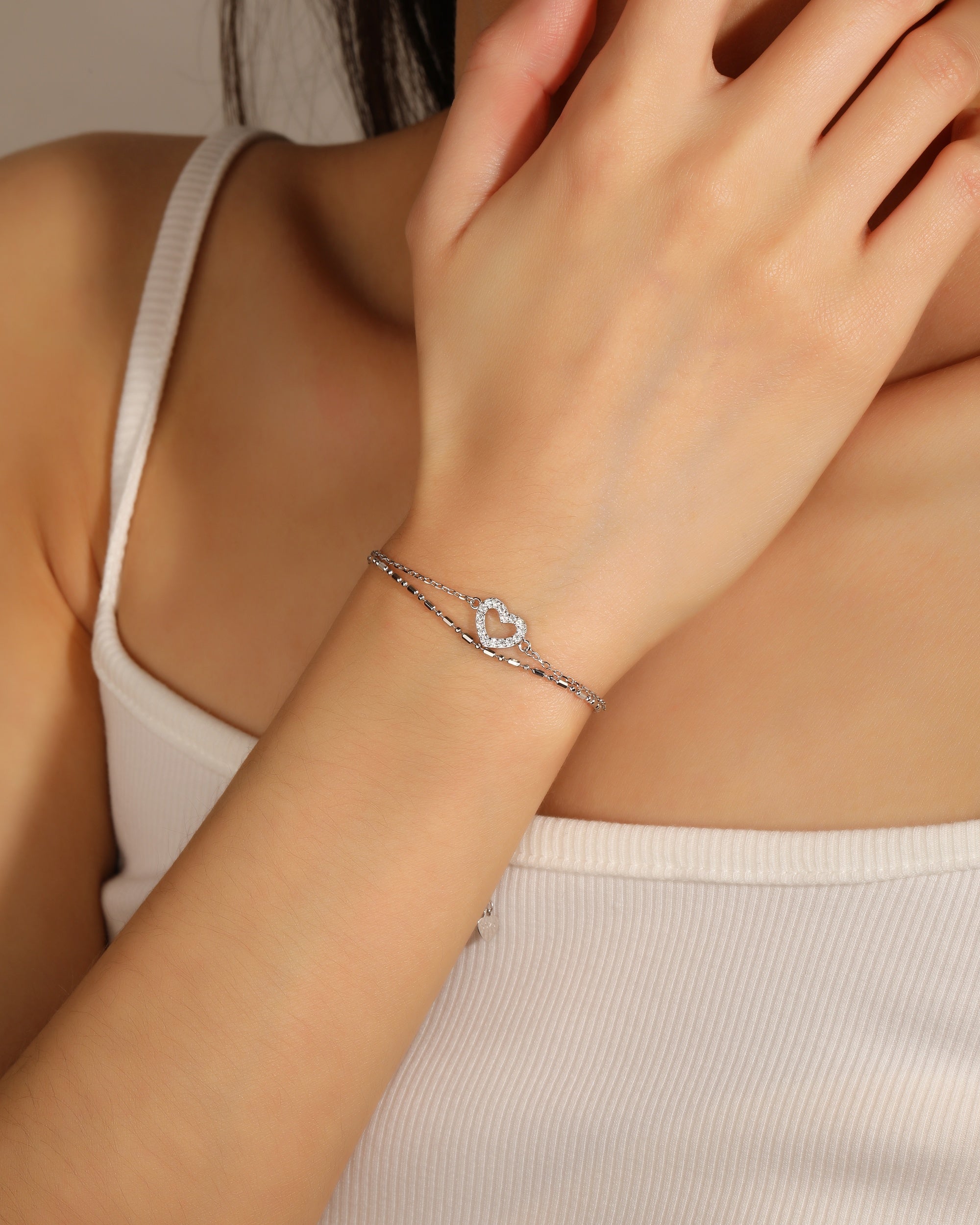 Pulsera doble de corazon con circonia blanca 17+3cm en rodizado