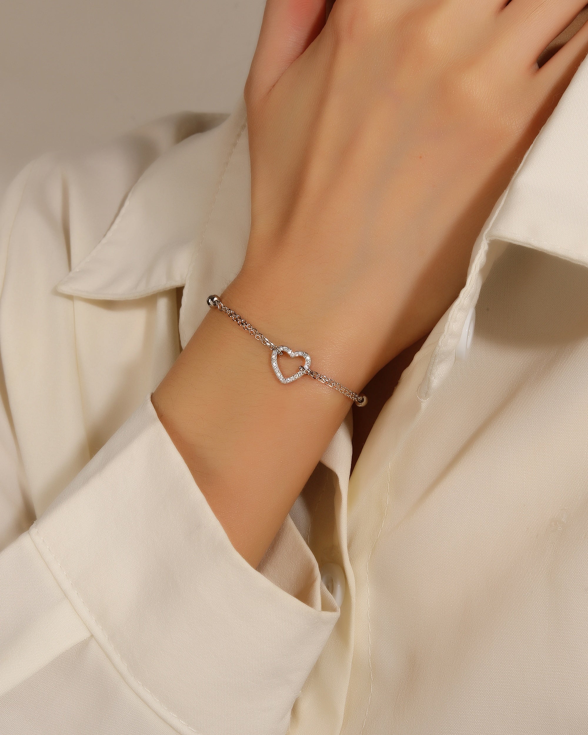 Pulsera doble de corazon con circonia blanca 17+3cm en rodizado