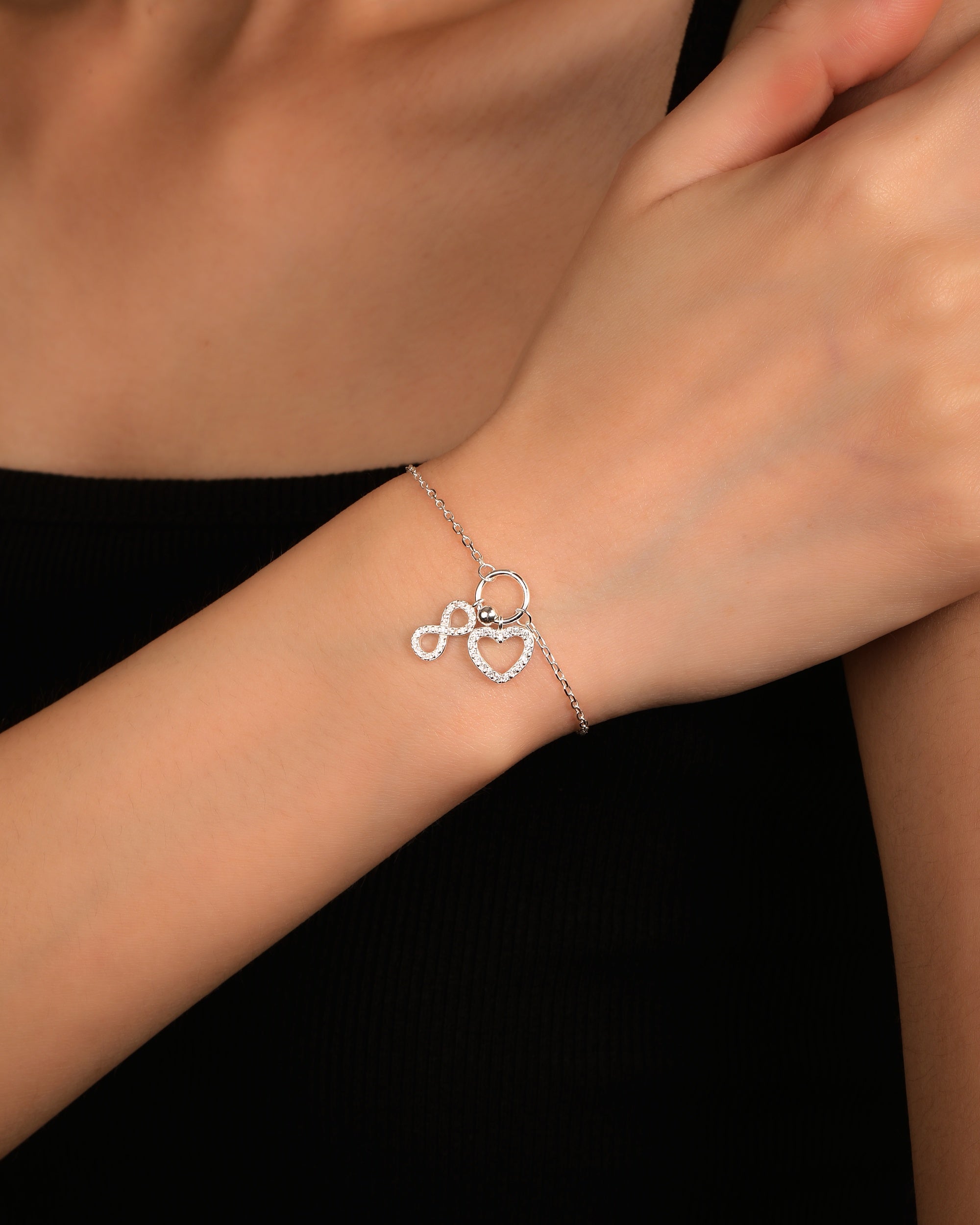 Pulsera de corazon/infinito con circonia blanca de 17+3cm en plateado