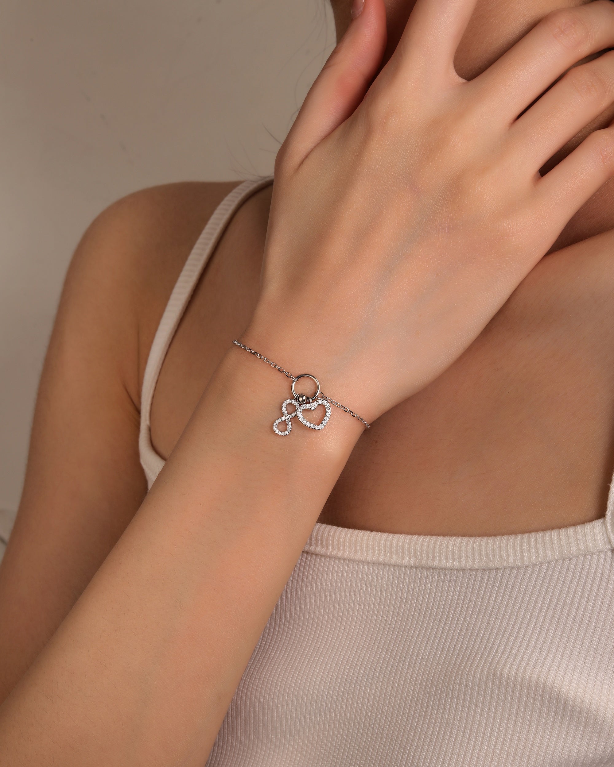 Pulsera de corazon/infinito con circonia blanca de 17+3cm en rodizado