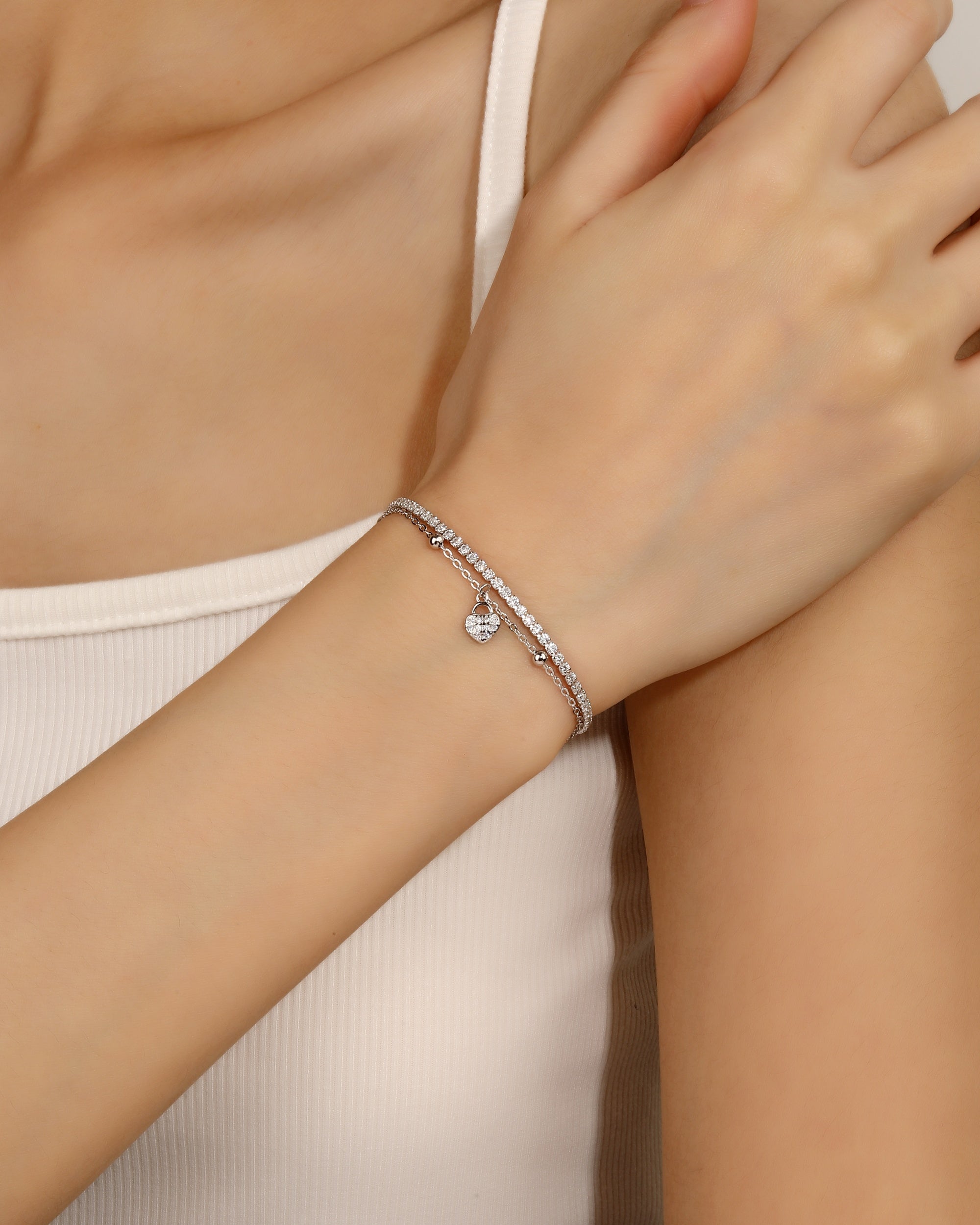 Pulsera doble de corazon con circonia blanca de 17+3cm en rodizado