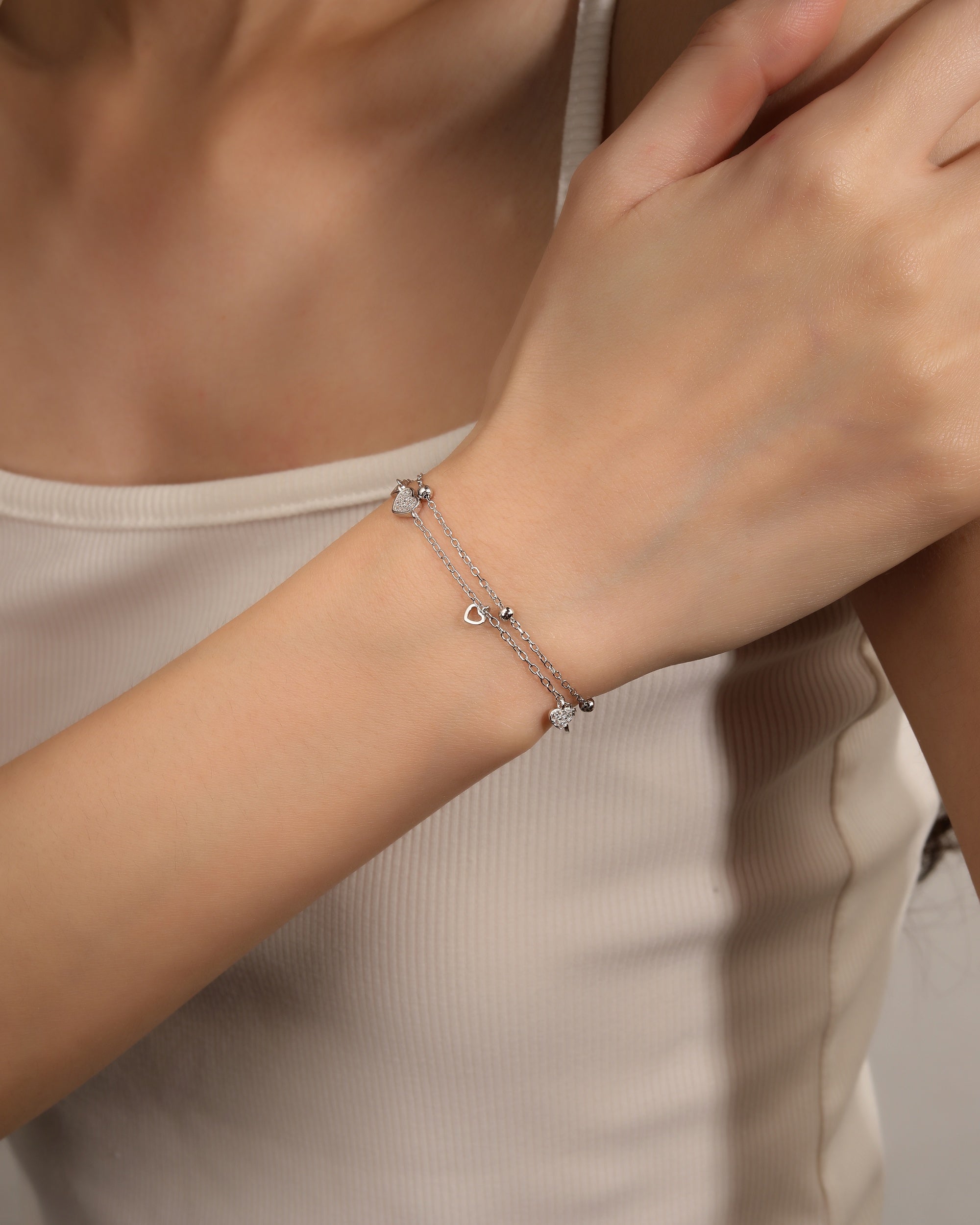 Pulsera doble de corazones con circonia blanca de 17+3cm en rodizado