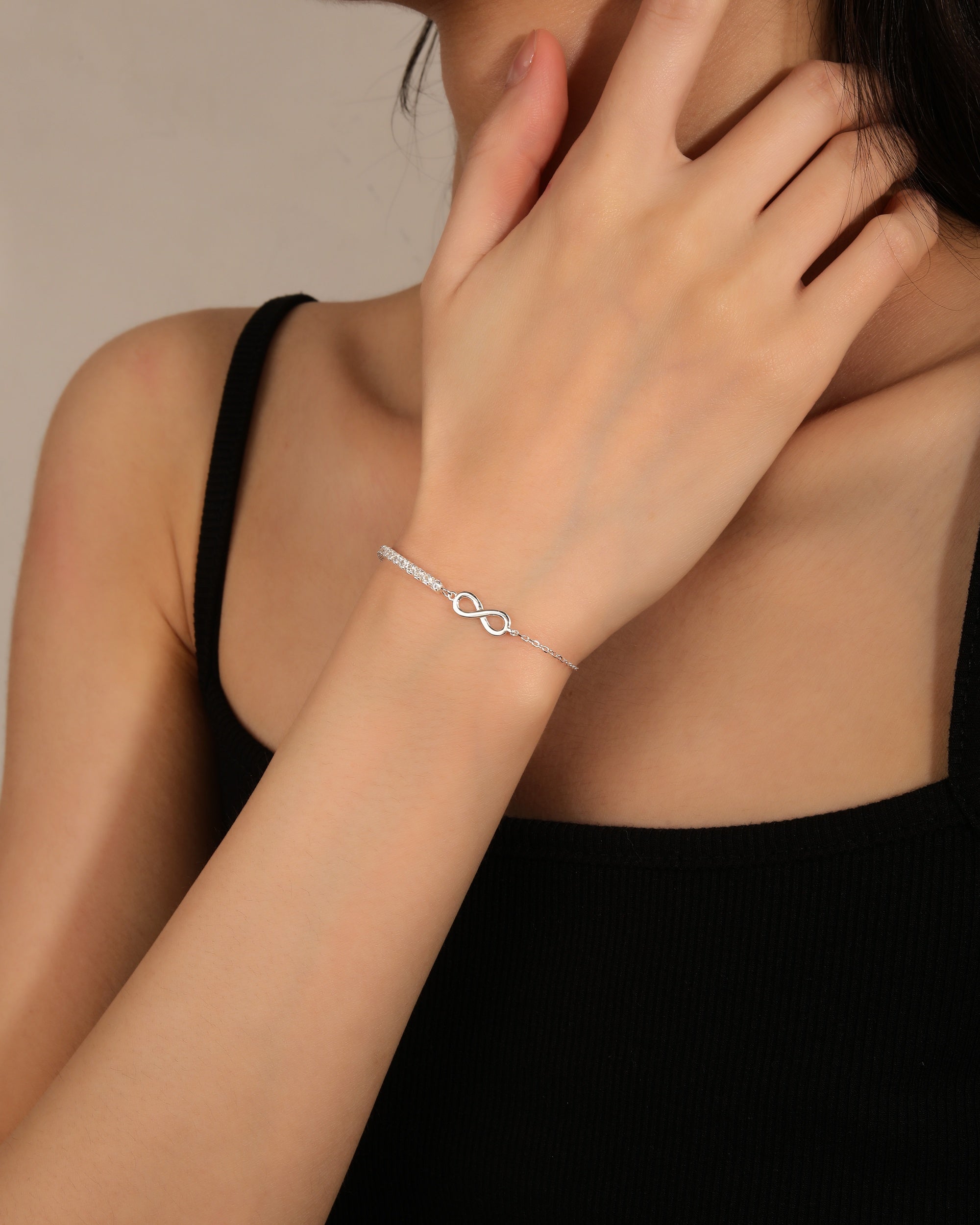 Pulsera tenis de infinito con circonia blanca de 17+3cm en plateado