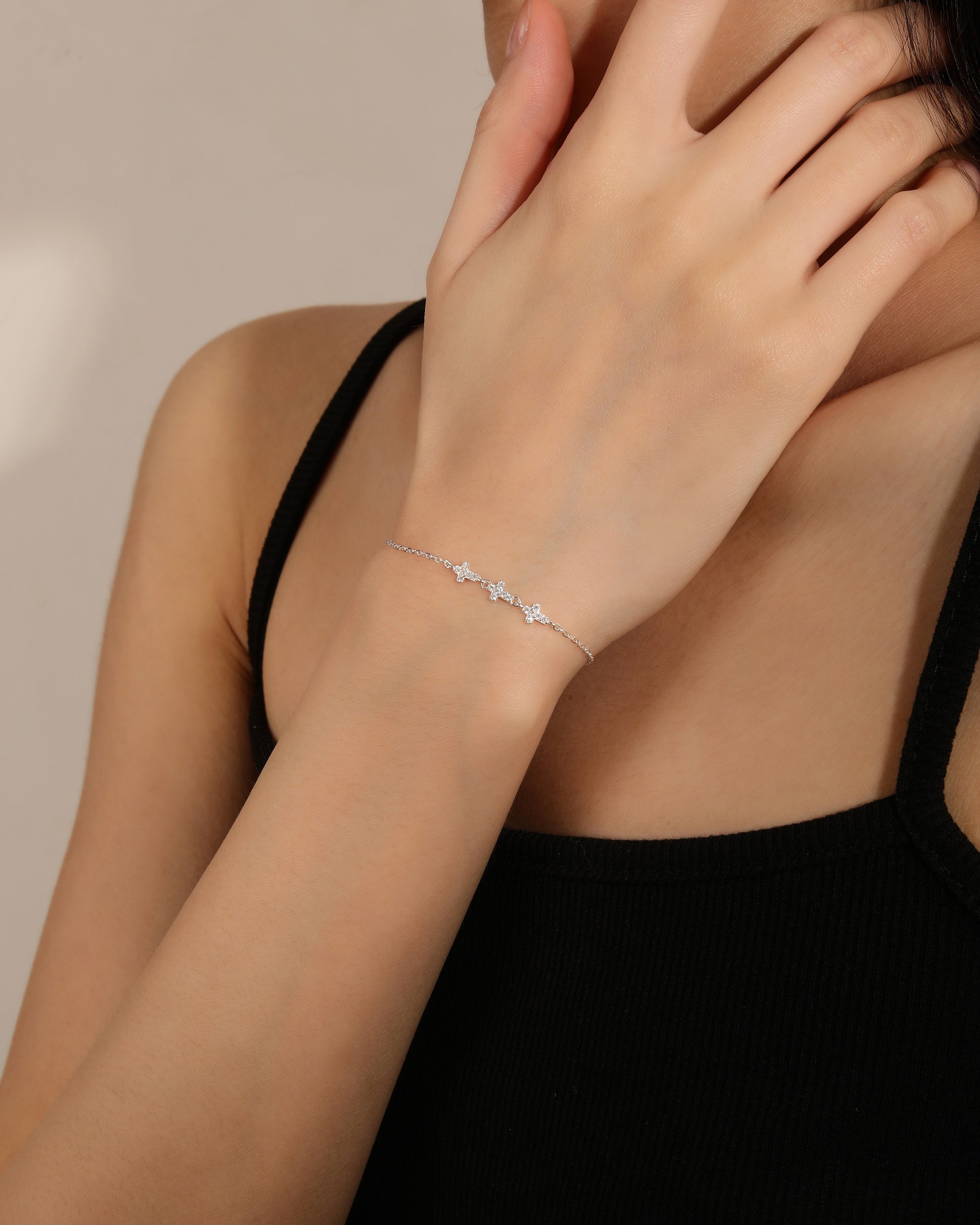 Pulsera de cruces con circonia blanca de 17+3cm en plateado