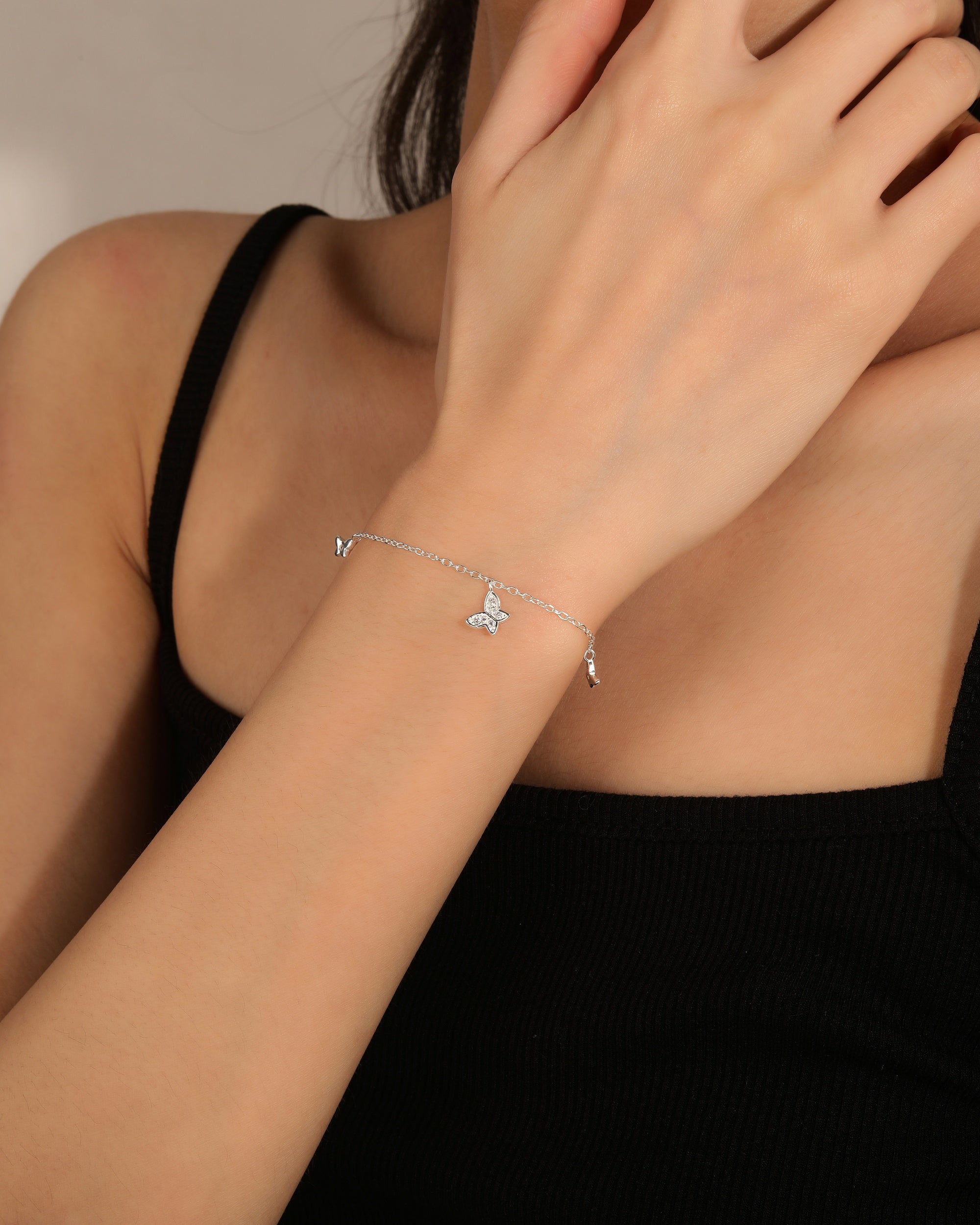 Pulsera de mariposas con circonia blanca de 17+3cm en plateado