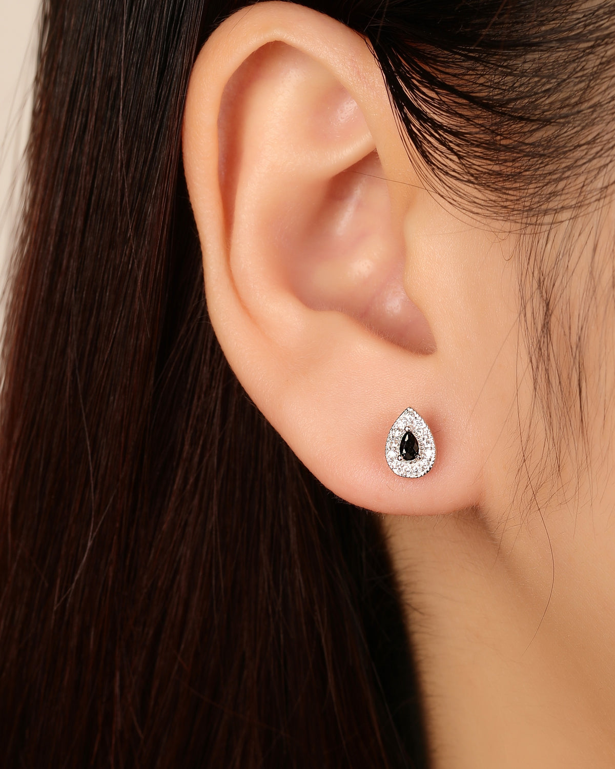 Arete halo gota con circonia gota central 8mm en rodizado