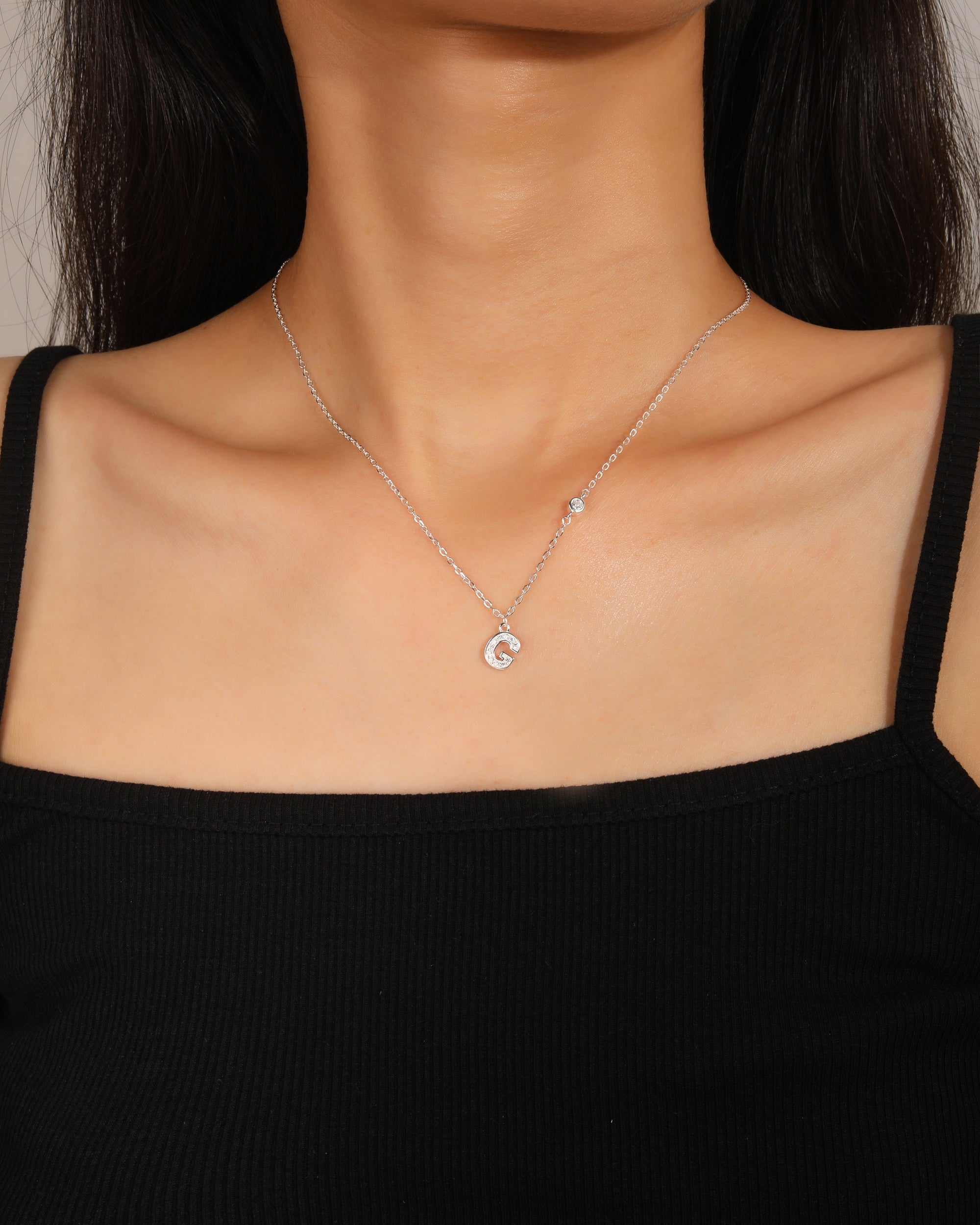 Collar con letra bisel liso con circonias blanca 45+5cm en plateado