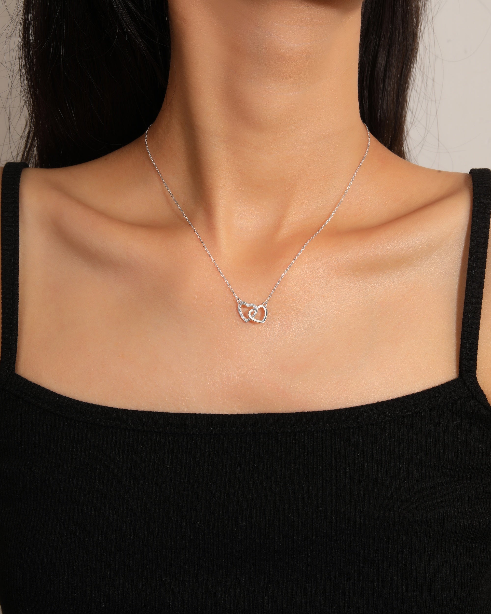 Collar de corazones entrelazados liso y circonias blanca 45+5cm en plateado