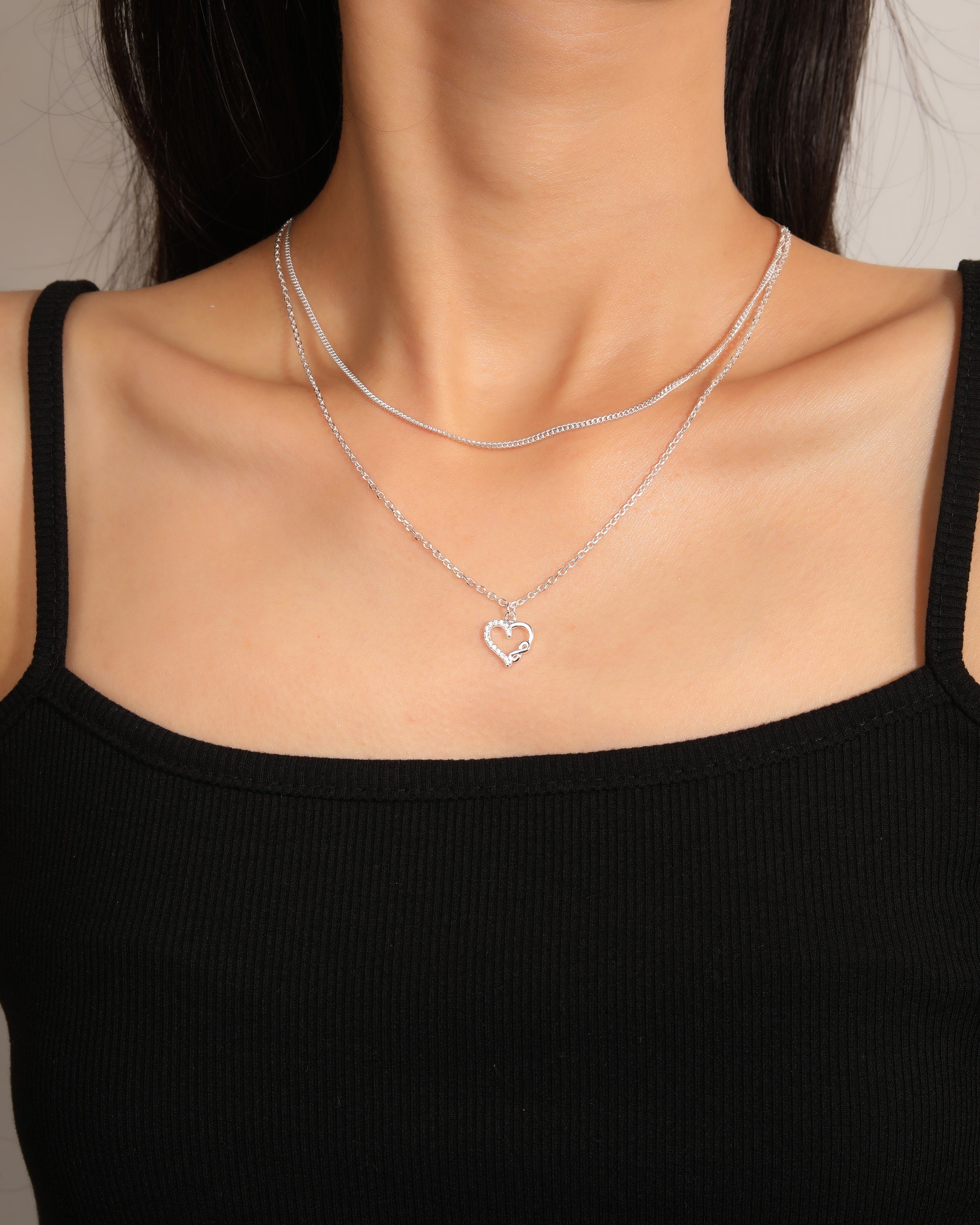 Collar doble de corazon e infinito con circonia blanca 45+5cm en plateado