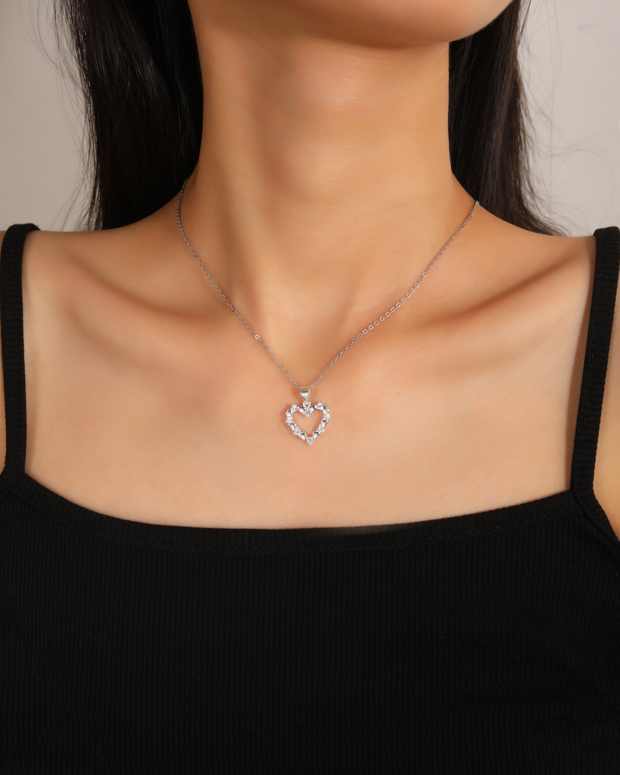 Dije de corazones lisos y con circonias blanca en plateado