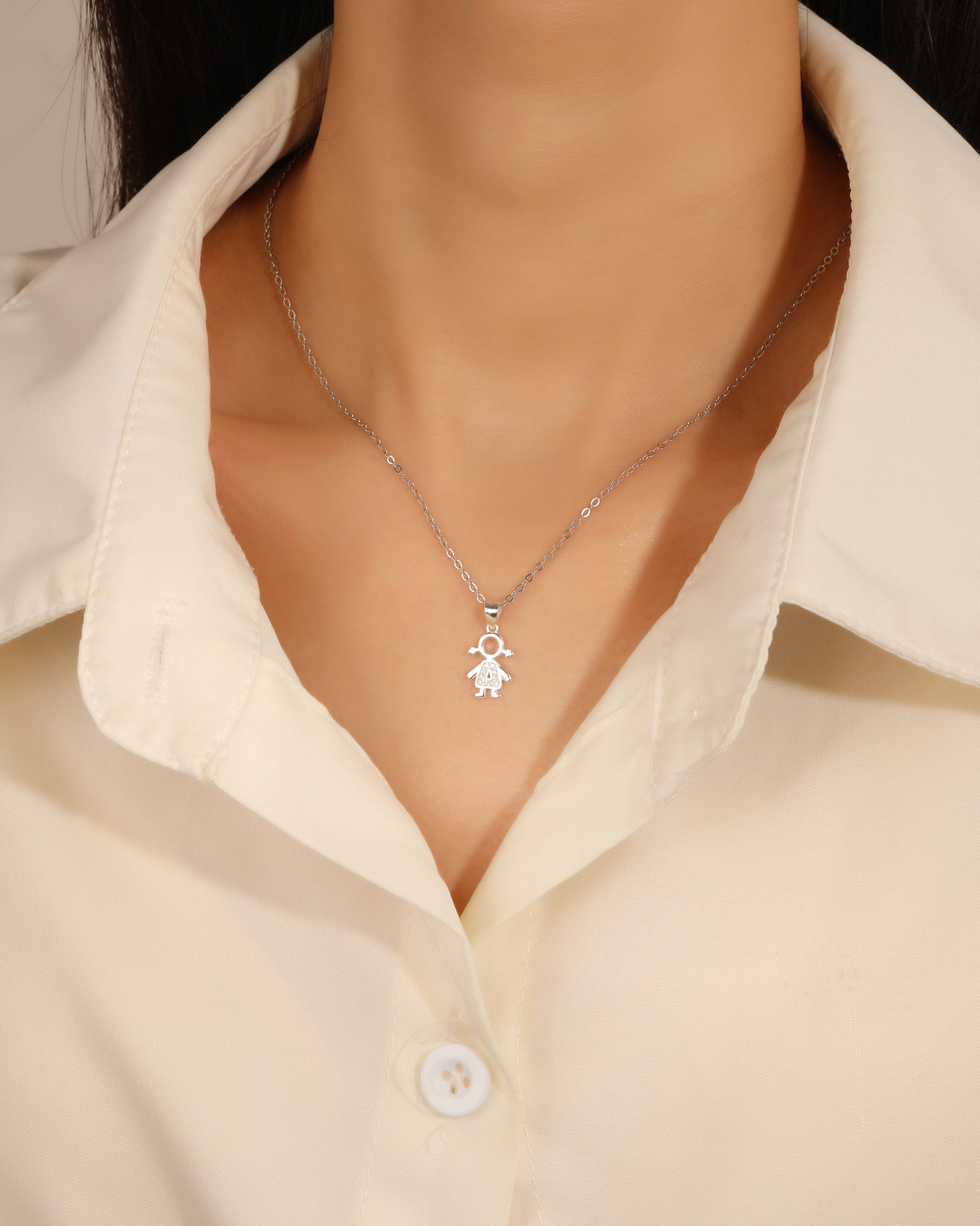 Dije de nii±a con circonias blanca en plateado