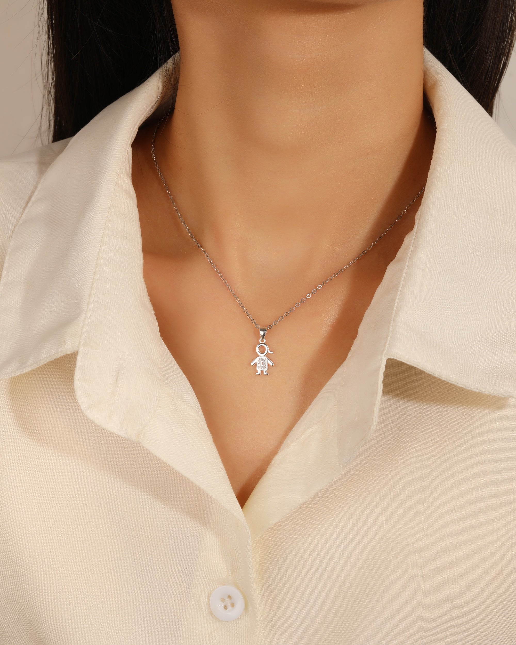 Dije de nii±o con circonias blanca en plateado