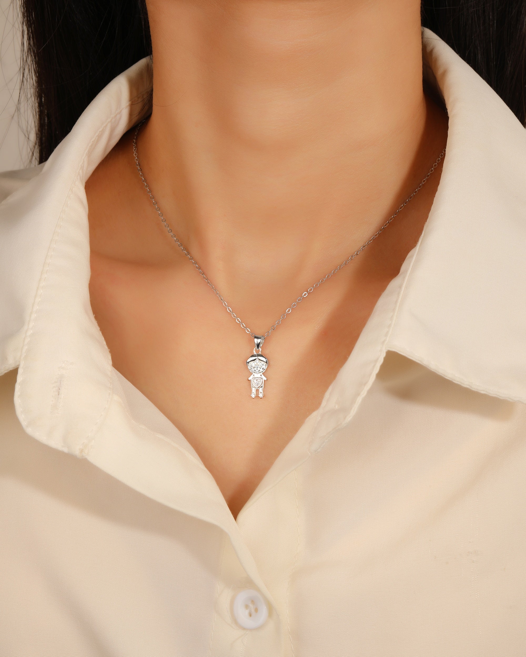 Dije de nii±o con circonias blanca en plateado