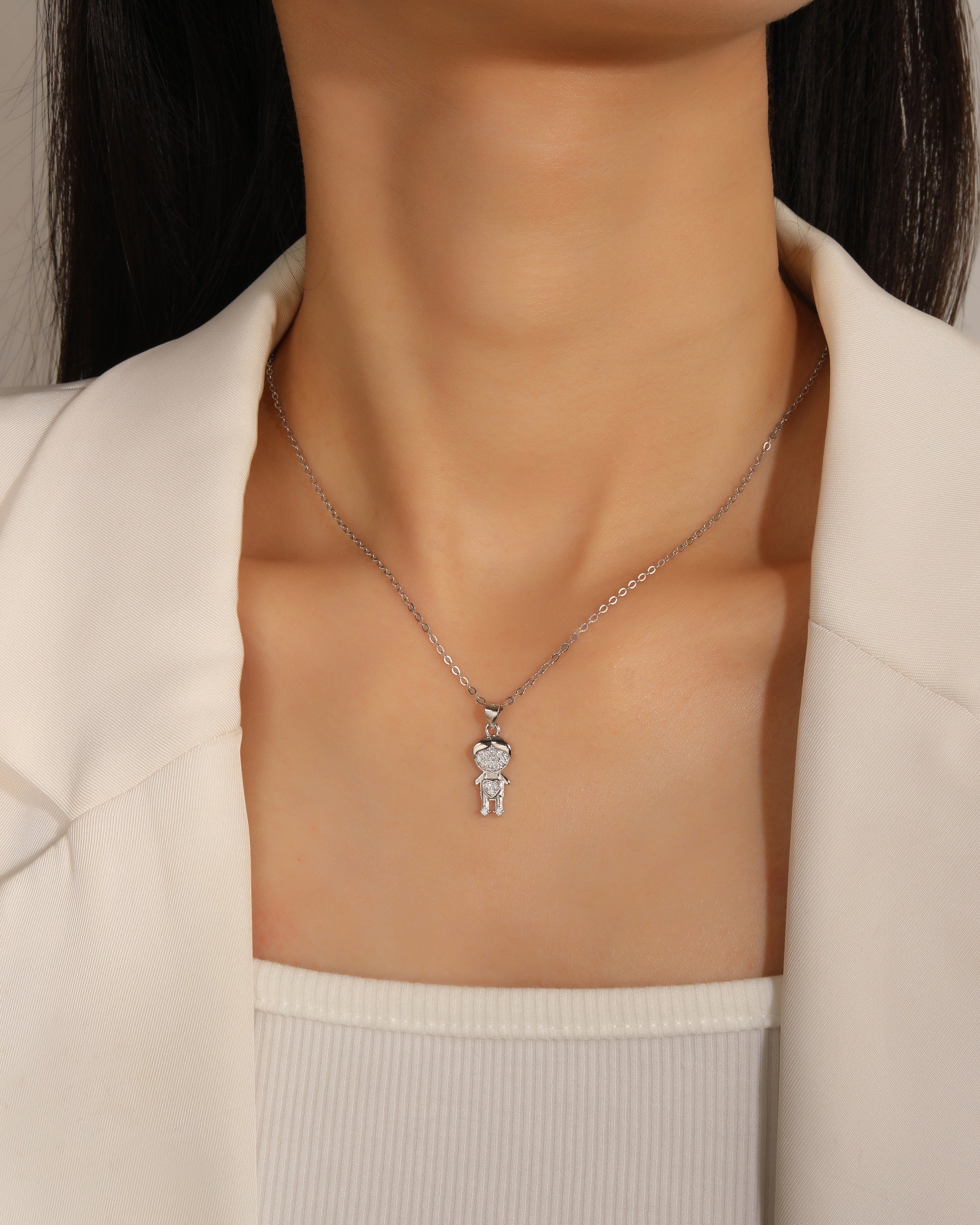 Dije de nii±o con circonias blanca en rodizado