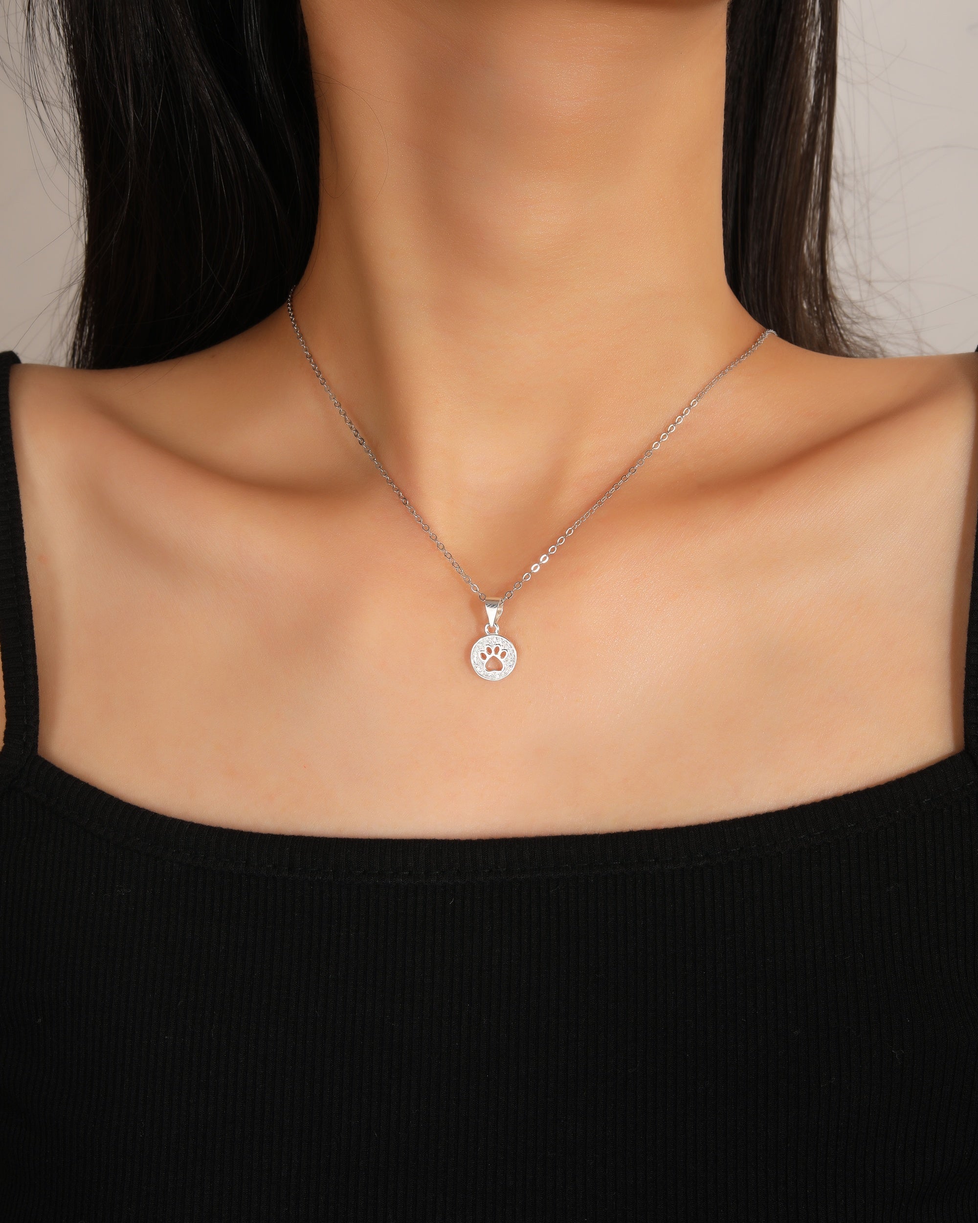 Dije de huella con circonias blanca en plateado