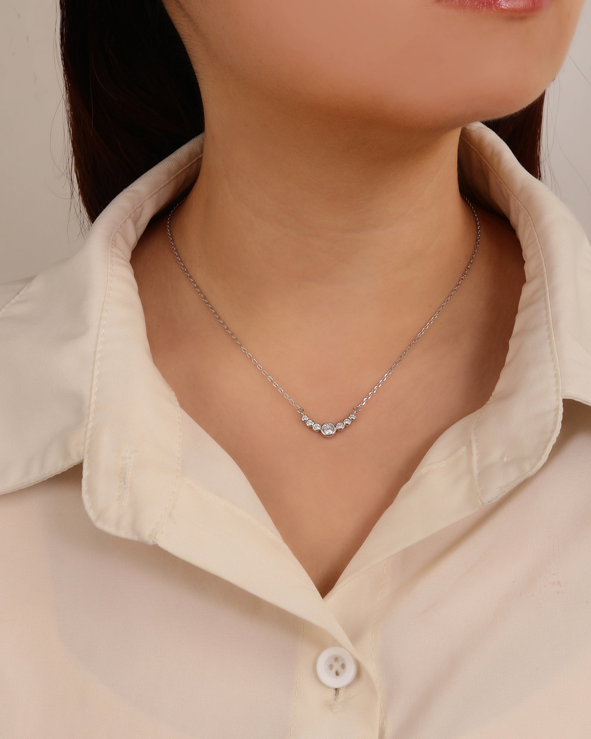 Juego collar y aretes de circulos con circonia blanca de 45+5cm en rodizado