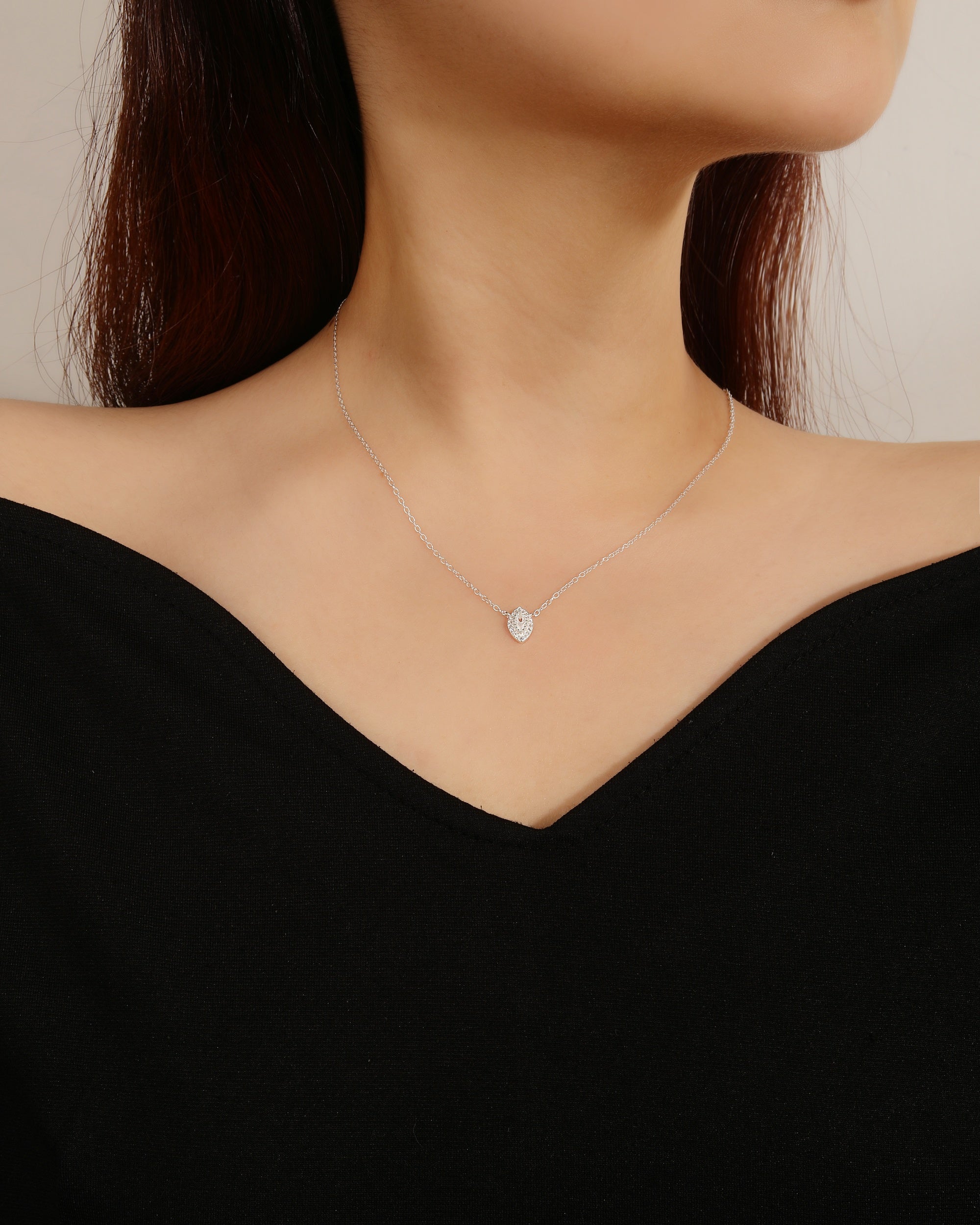 Juego collar y aretes de ojo con circonia de 45+5cm en plateado