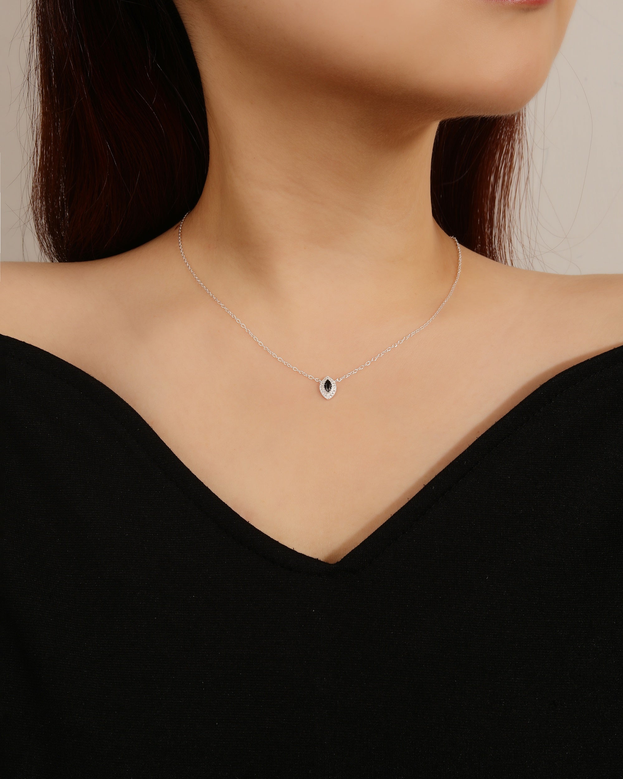 Juego collar y aretes de ojo con circonia de 45+5cm en plateado