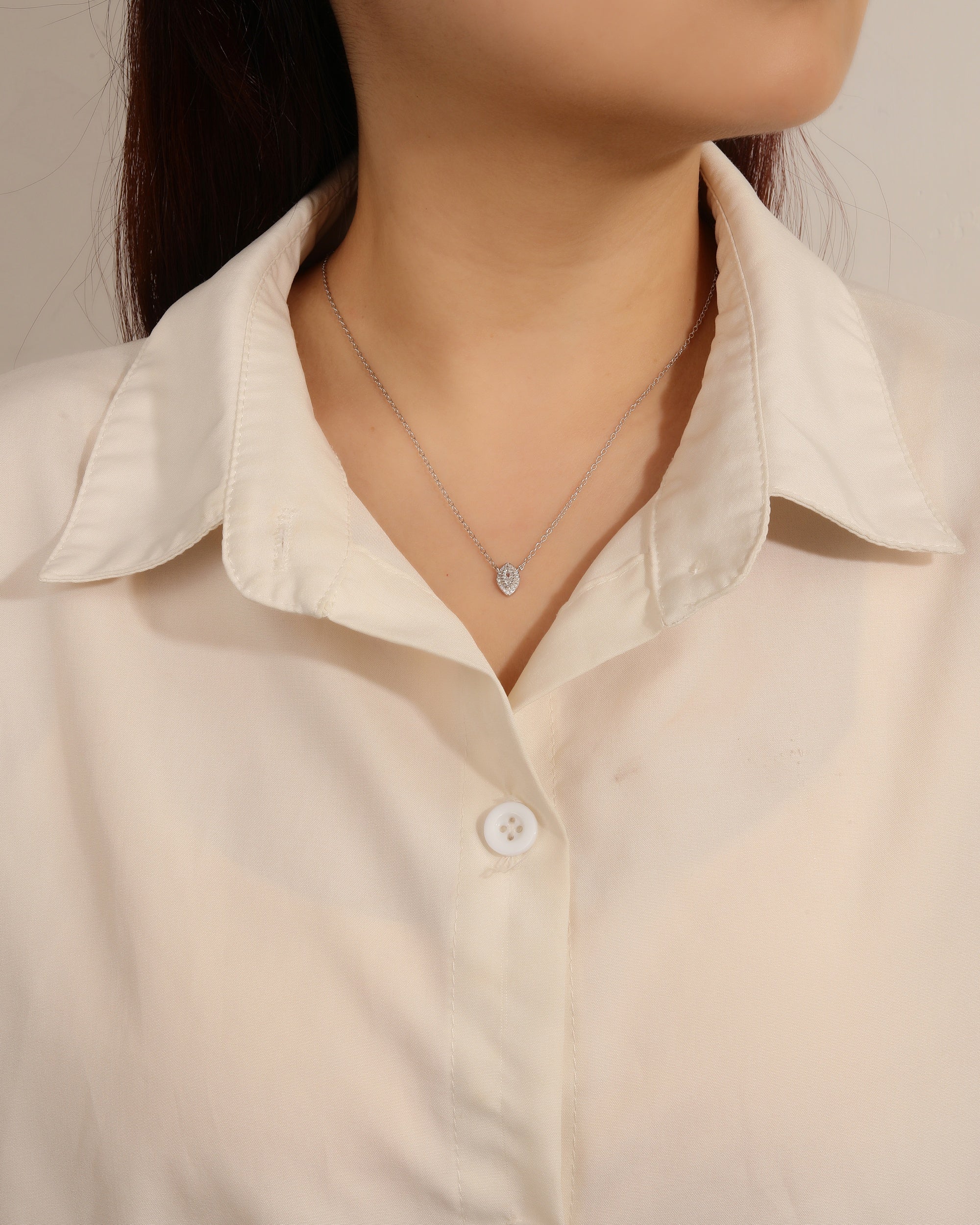 Juego collar y aretes de ojo con circonia de 45+5cm en rodizado