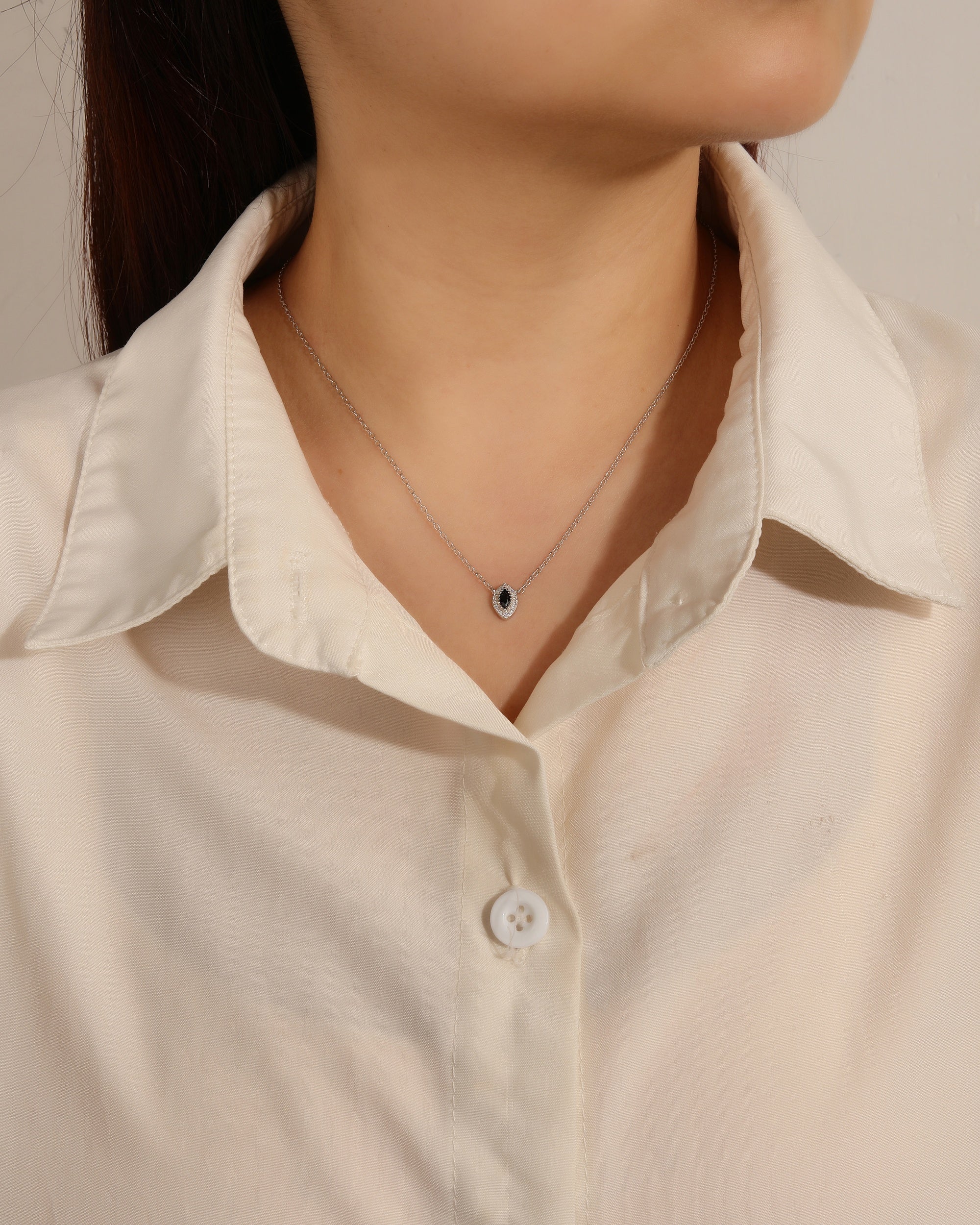 Juego collar y aretes de ojo con circonia de 45+5cm en rodizado