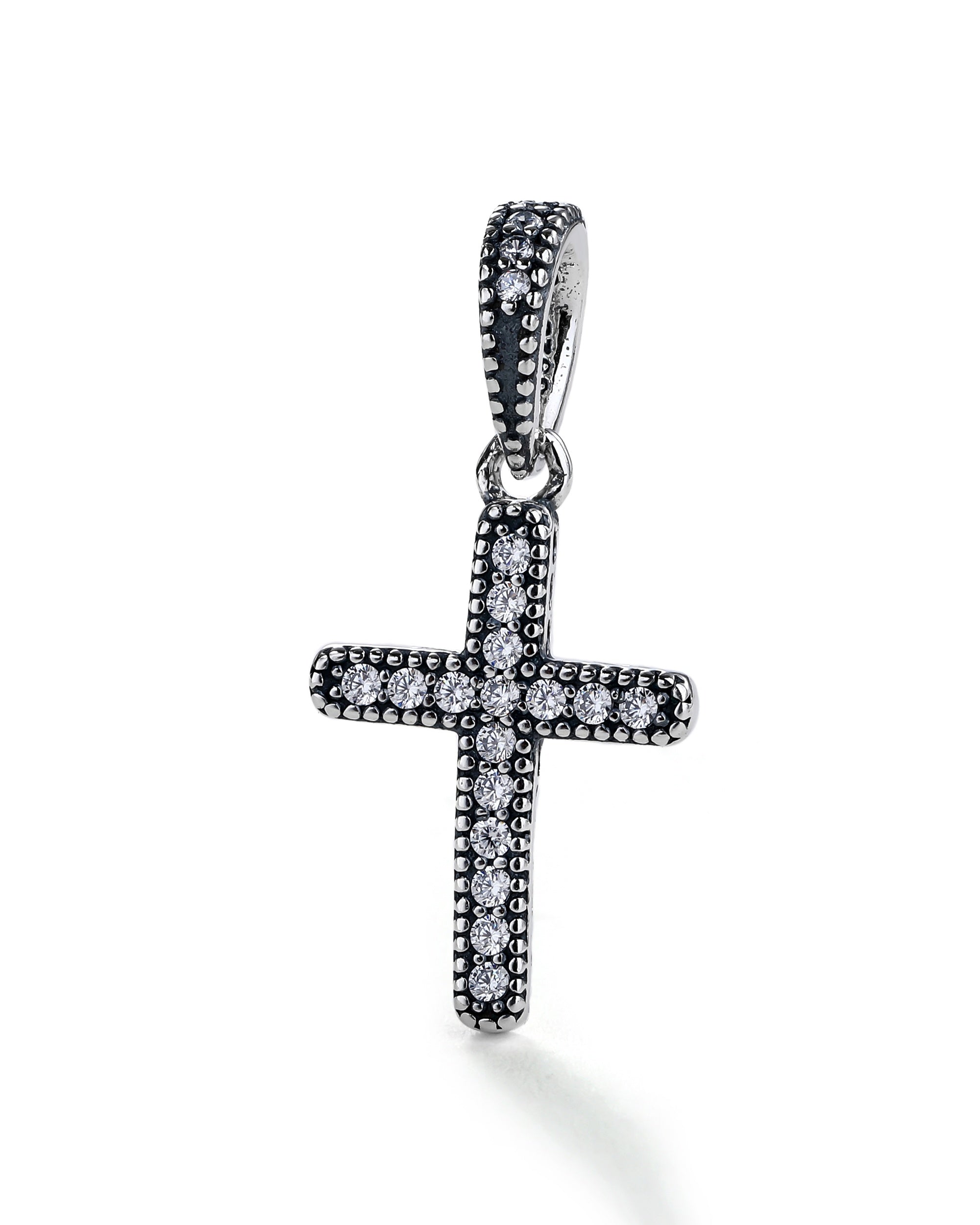 Charm colgante de Cruz con circonia blanca en oxidada