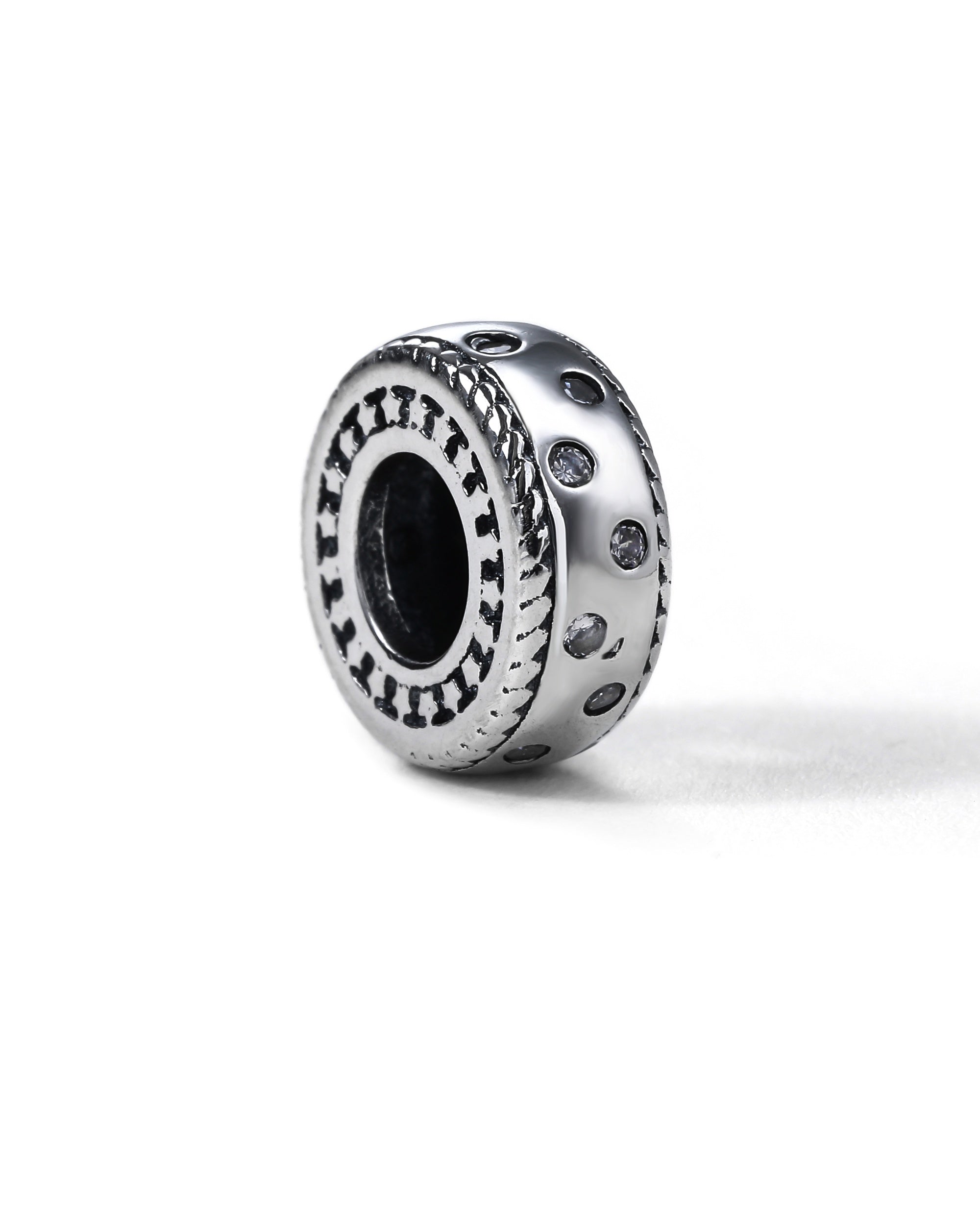 Charm separador de dona con circonia blanca en oxidada