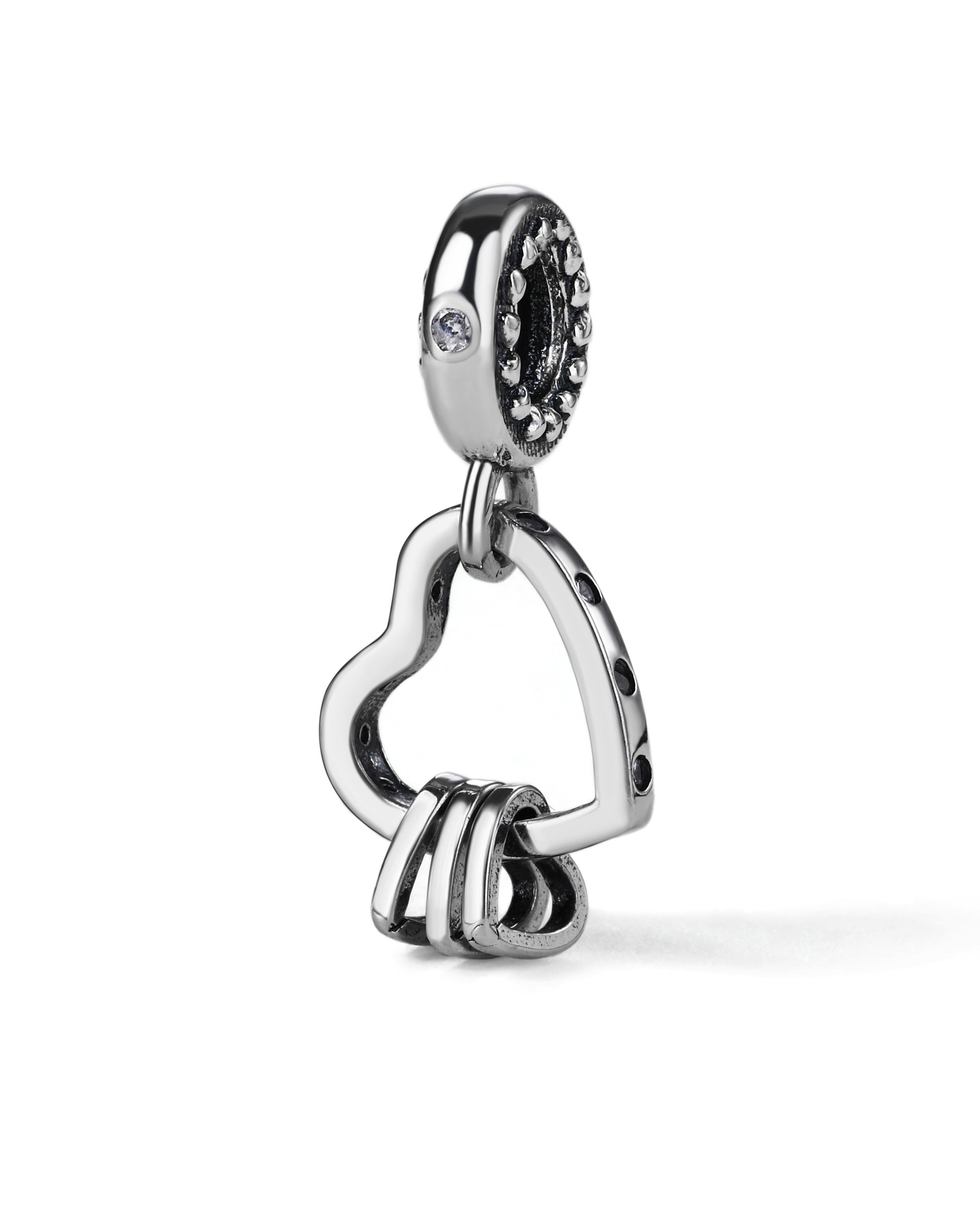 Charm colgante de corazones con circonia blanca en oxidada