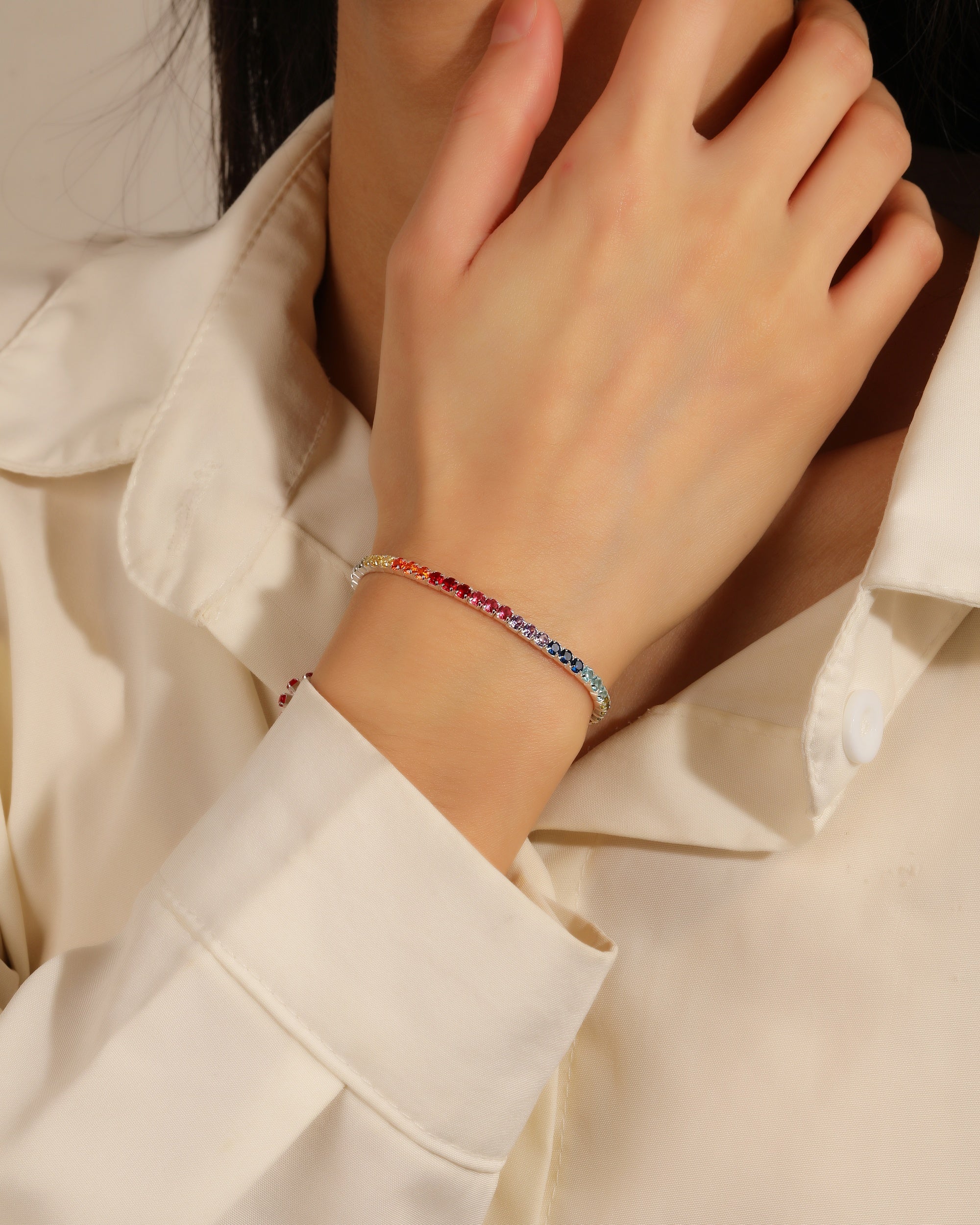 Pulsera tenis elastica con circonia redonda multicolor 17cm en plateado