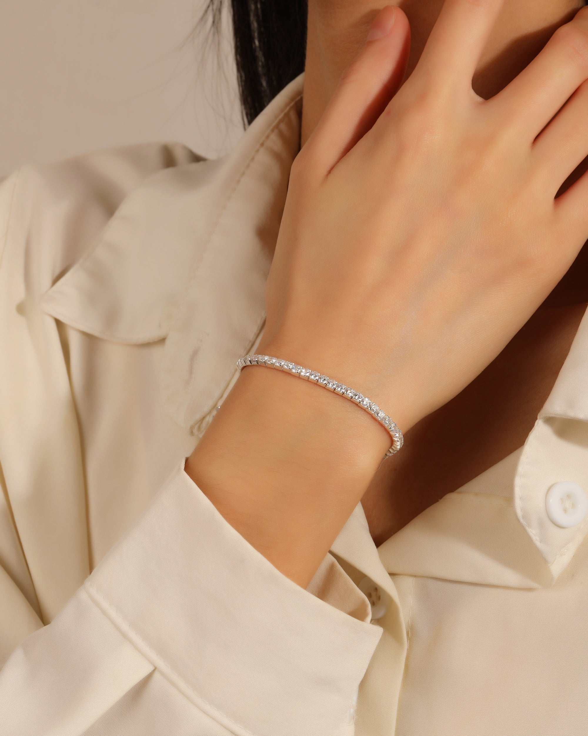 Pulsera tenis 2mm elastica redondo con circonia blanca 18cm en plateado
