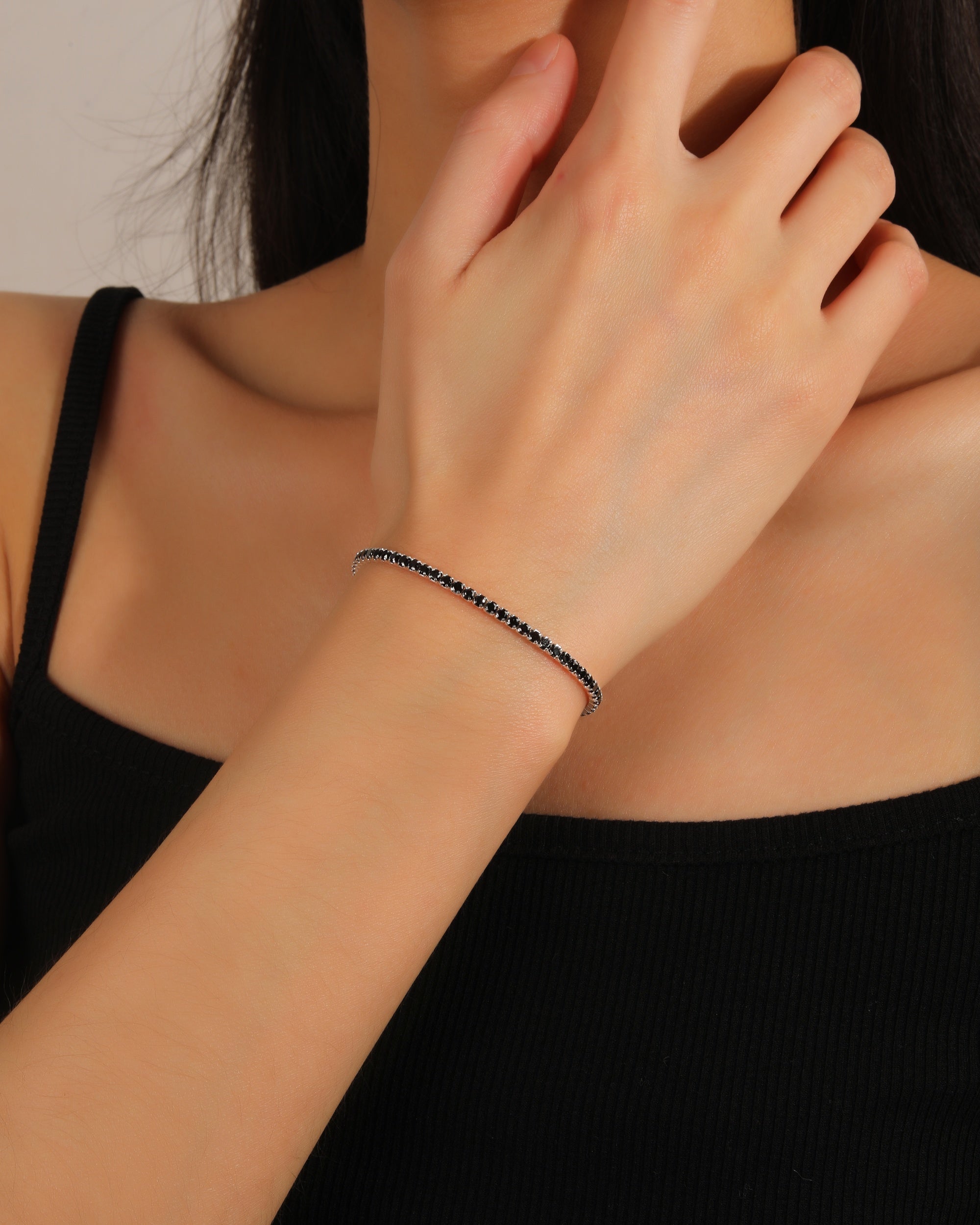 Pulsera tenis con circonia redonda de color 17+3cm en plateado