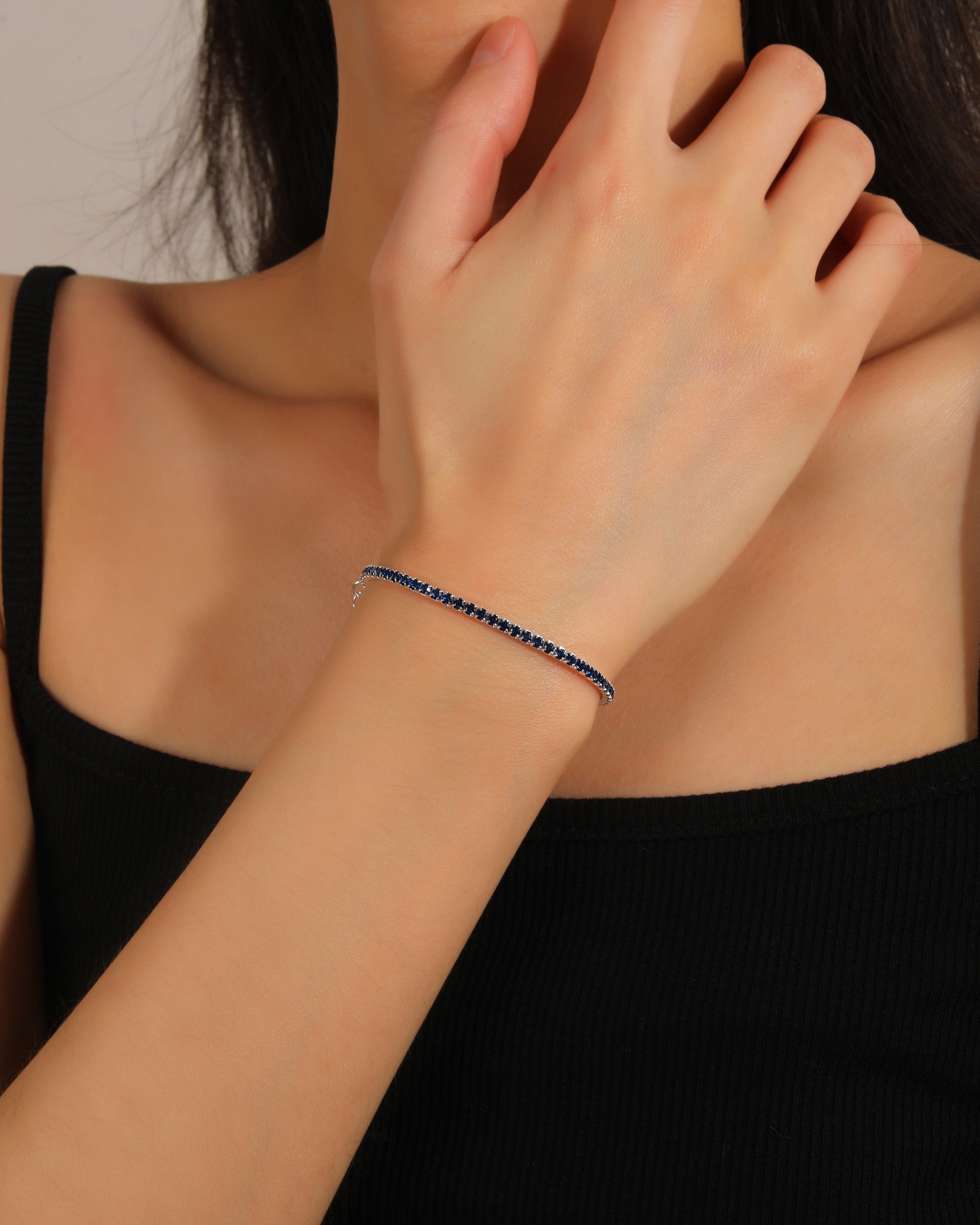 Pulsera tenis con circonia redonda de color 17+3cm en plateado