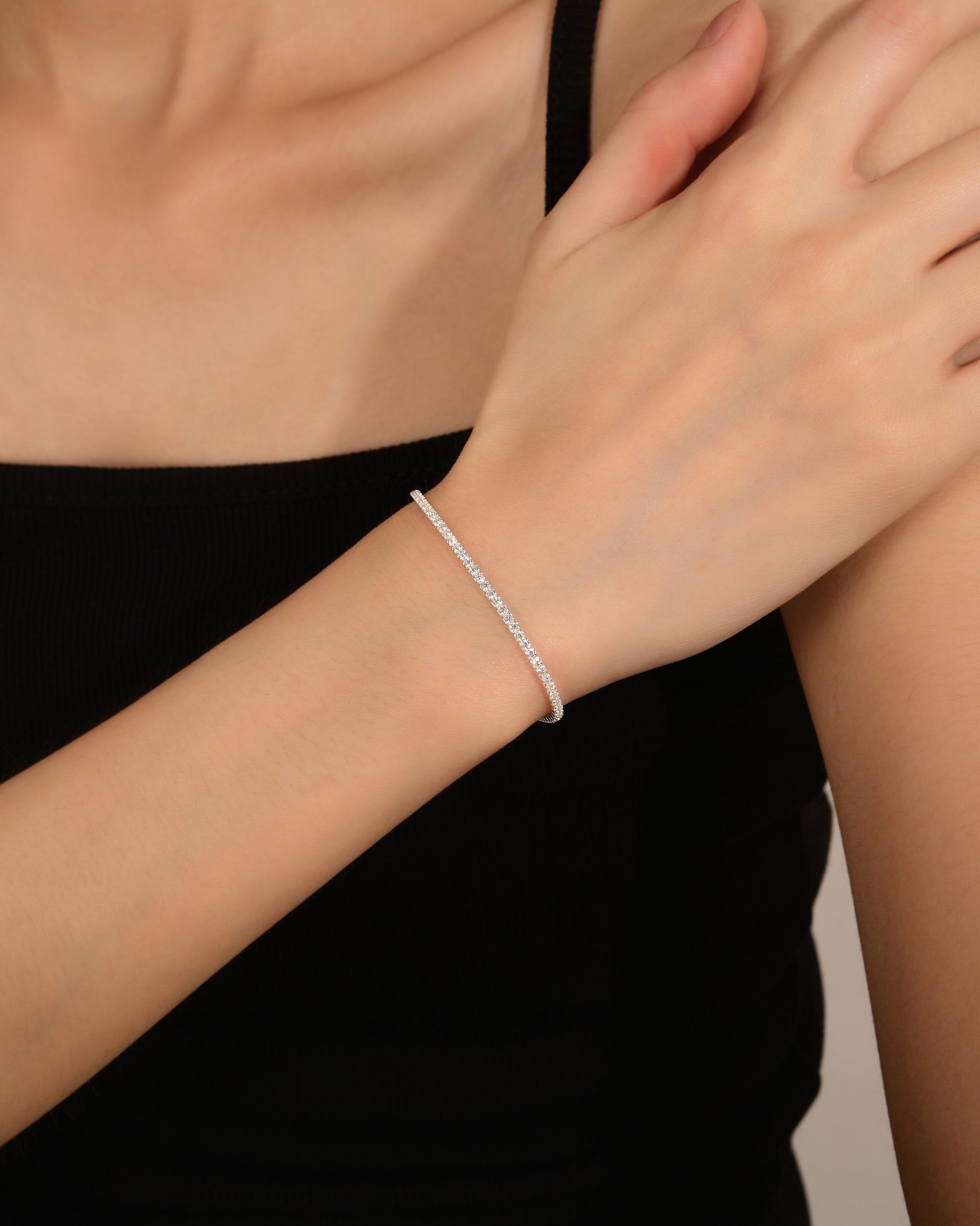Pulsera tenis con circonia redonda 16+7cm en plateado
