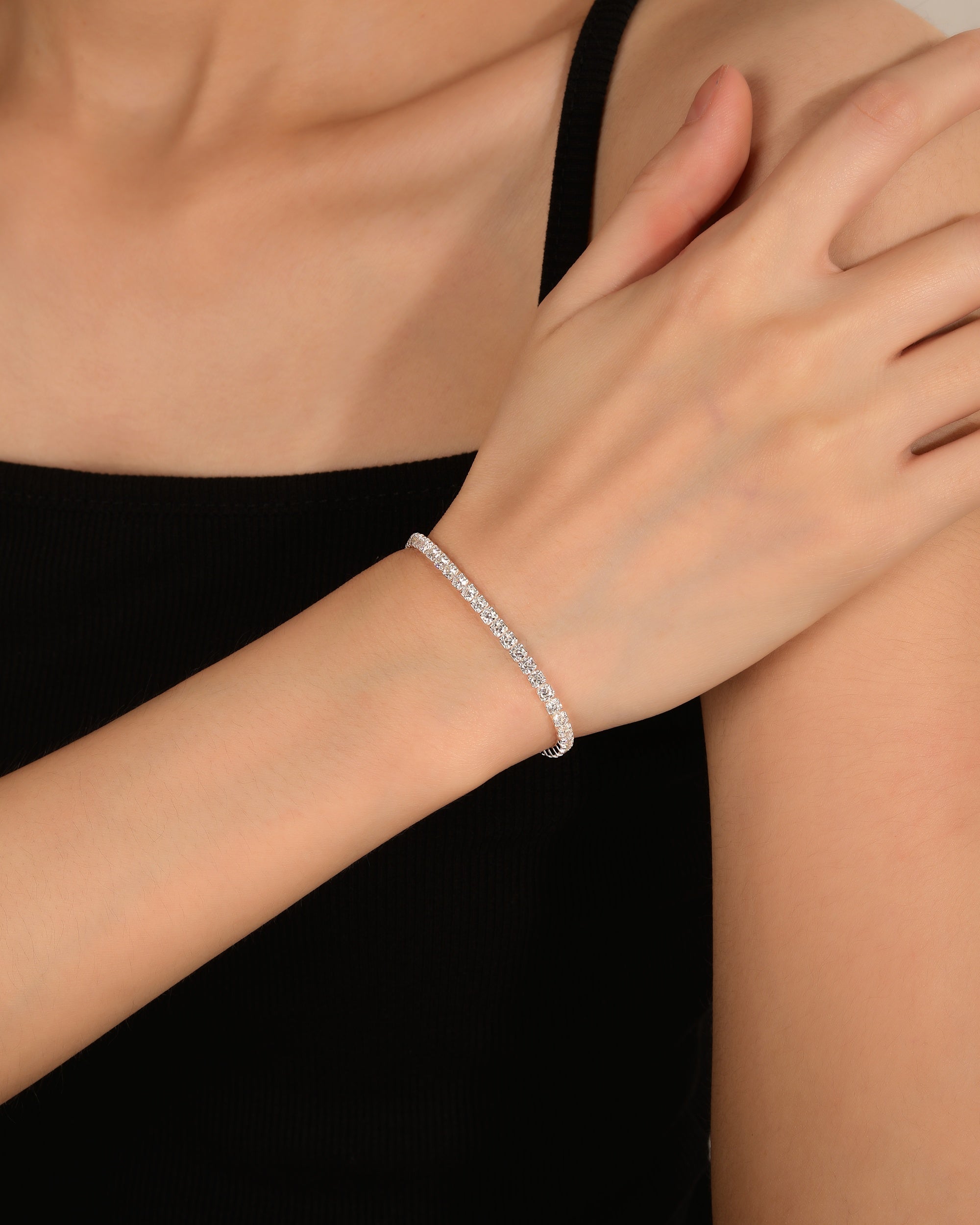 Pulsera tenis con circonia redonda blanca 16+7cm en plateado