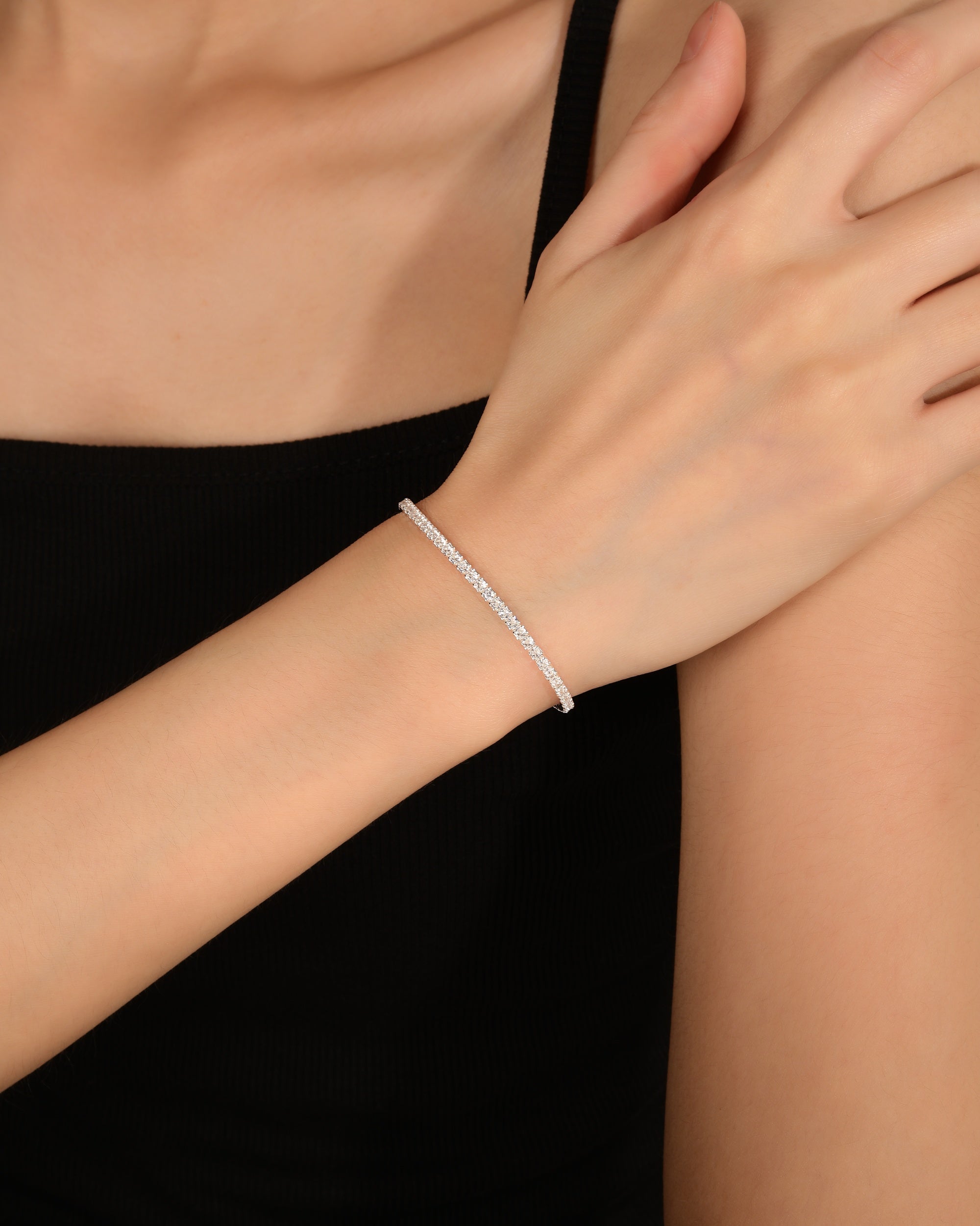 Pulsera tenis con circonia redonda blanca 16+7cm en plateado