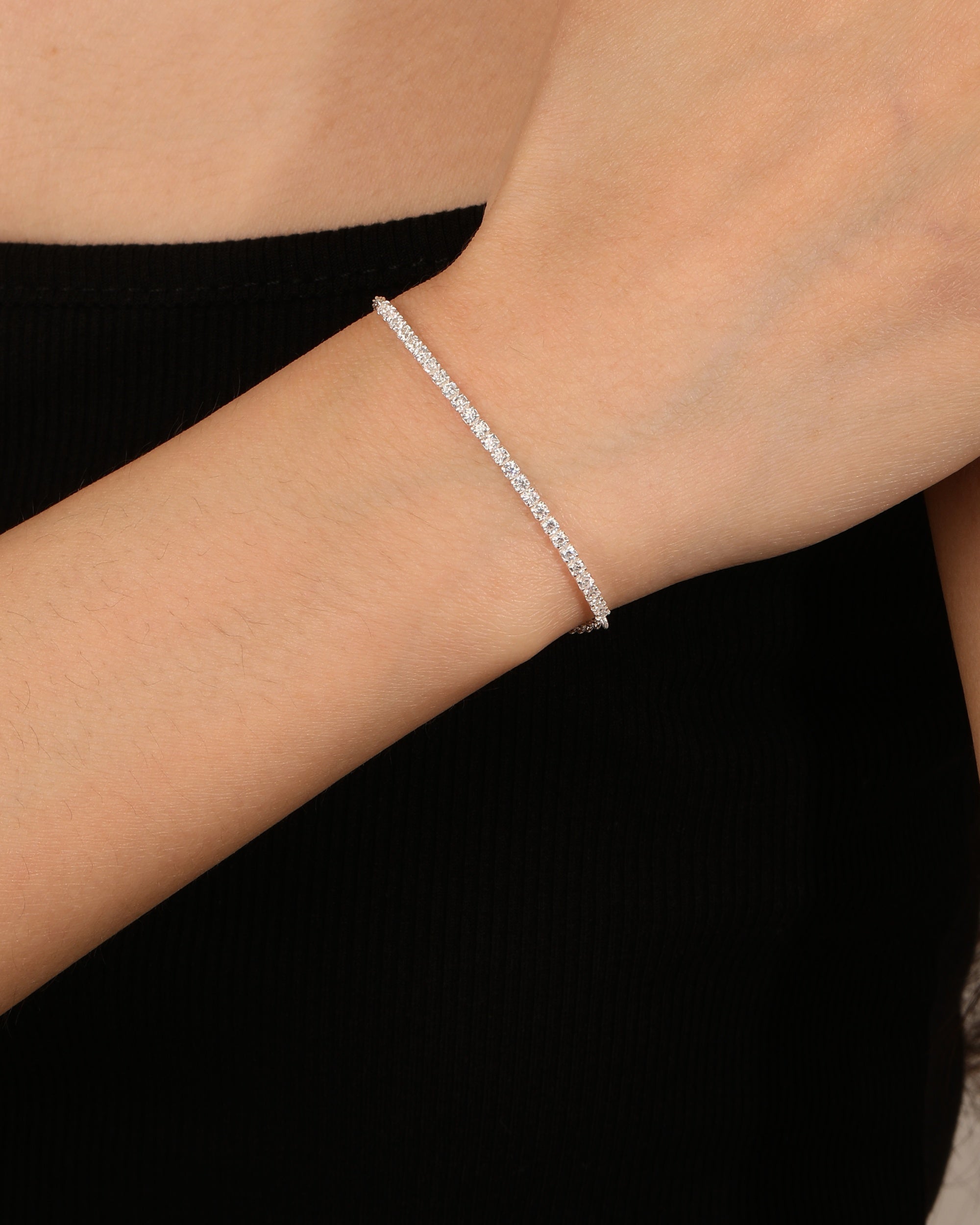 Pulsera tenis ajustable con circonia redonda 17+3cm en plateado