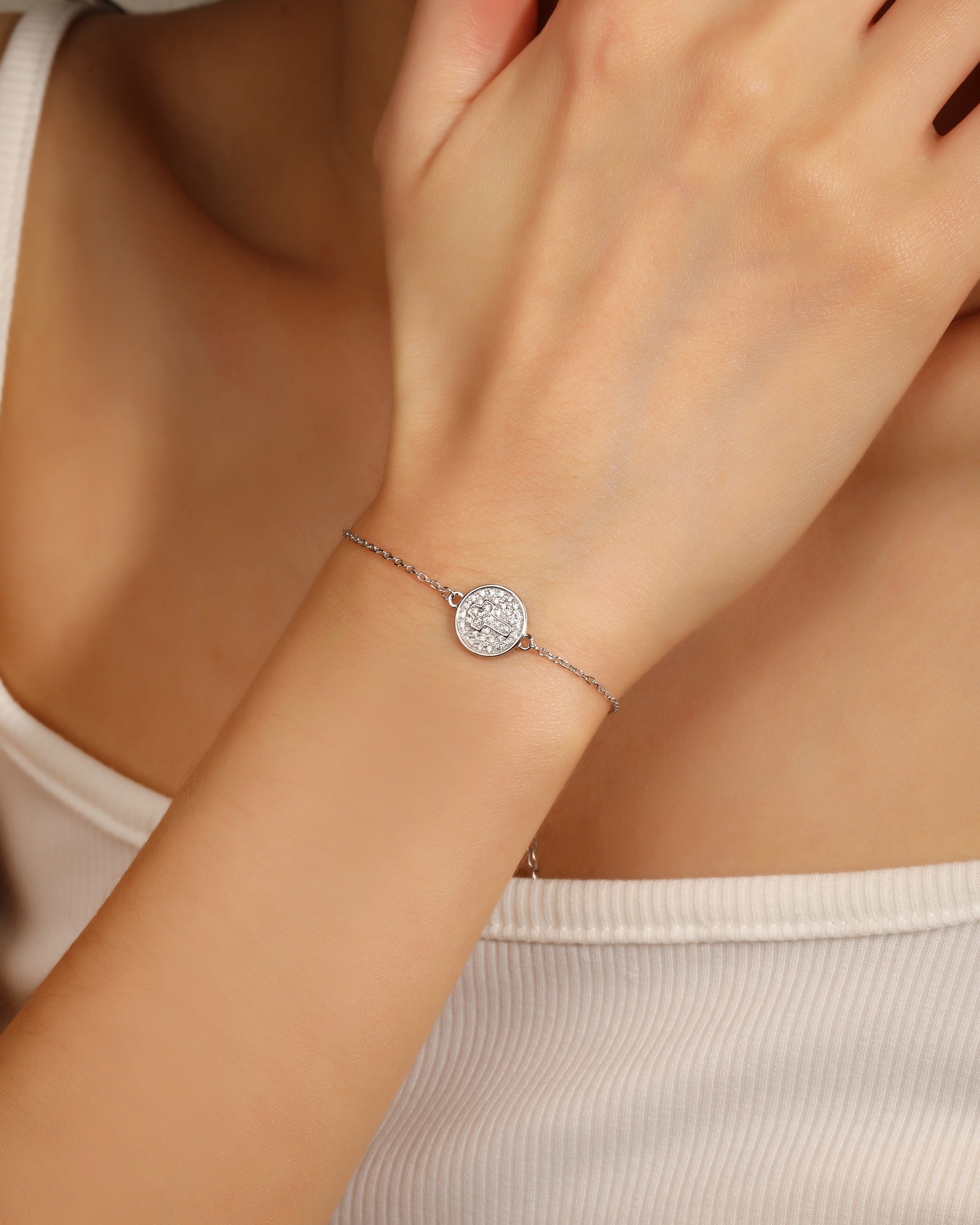Pulsera sencilla de Cruz con circonia blanca 17+3cm en rodizado