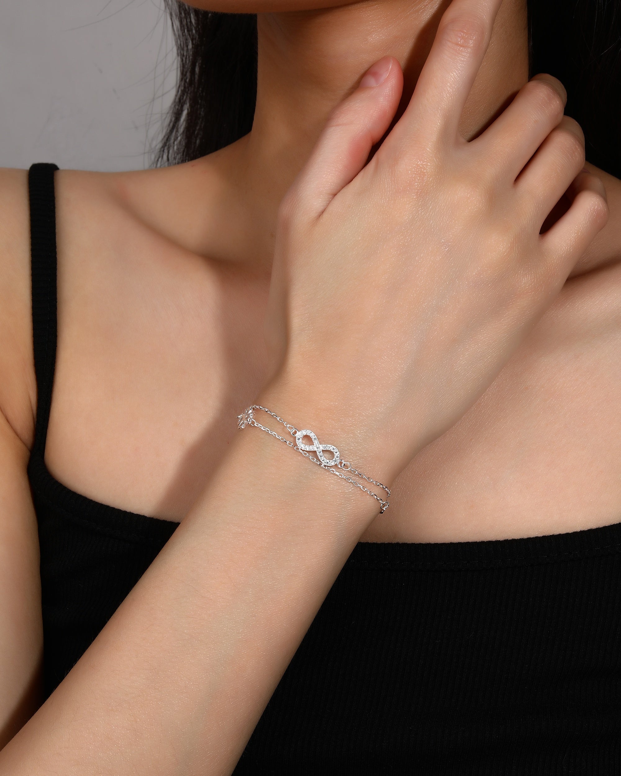 Pulsera doble de infinito con circonia blanca 17+3cm en plateado