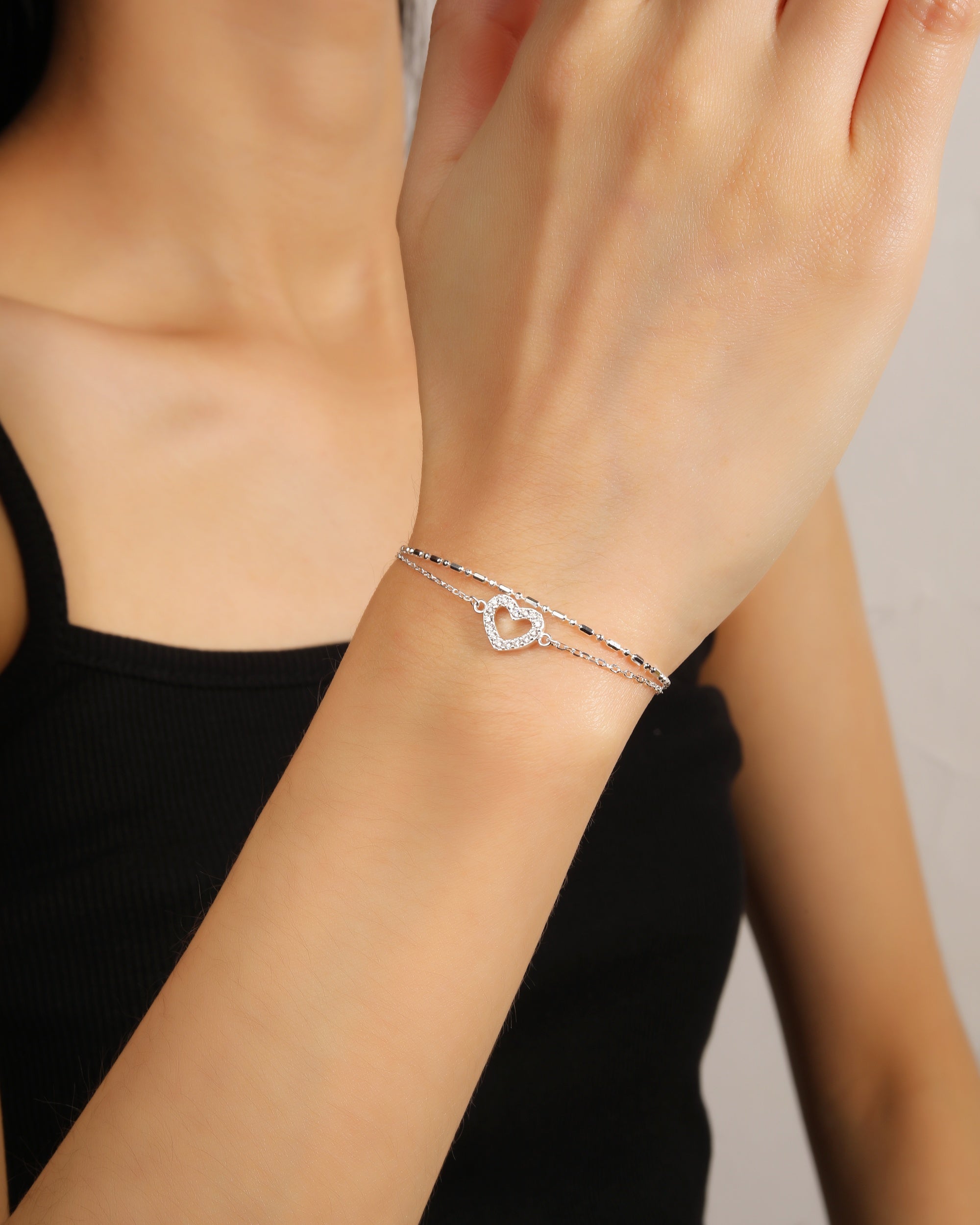 Pulsera doble de corazon con circonia blanca 17+3cm en plateado