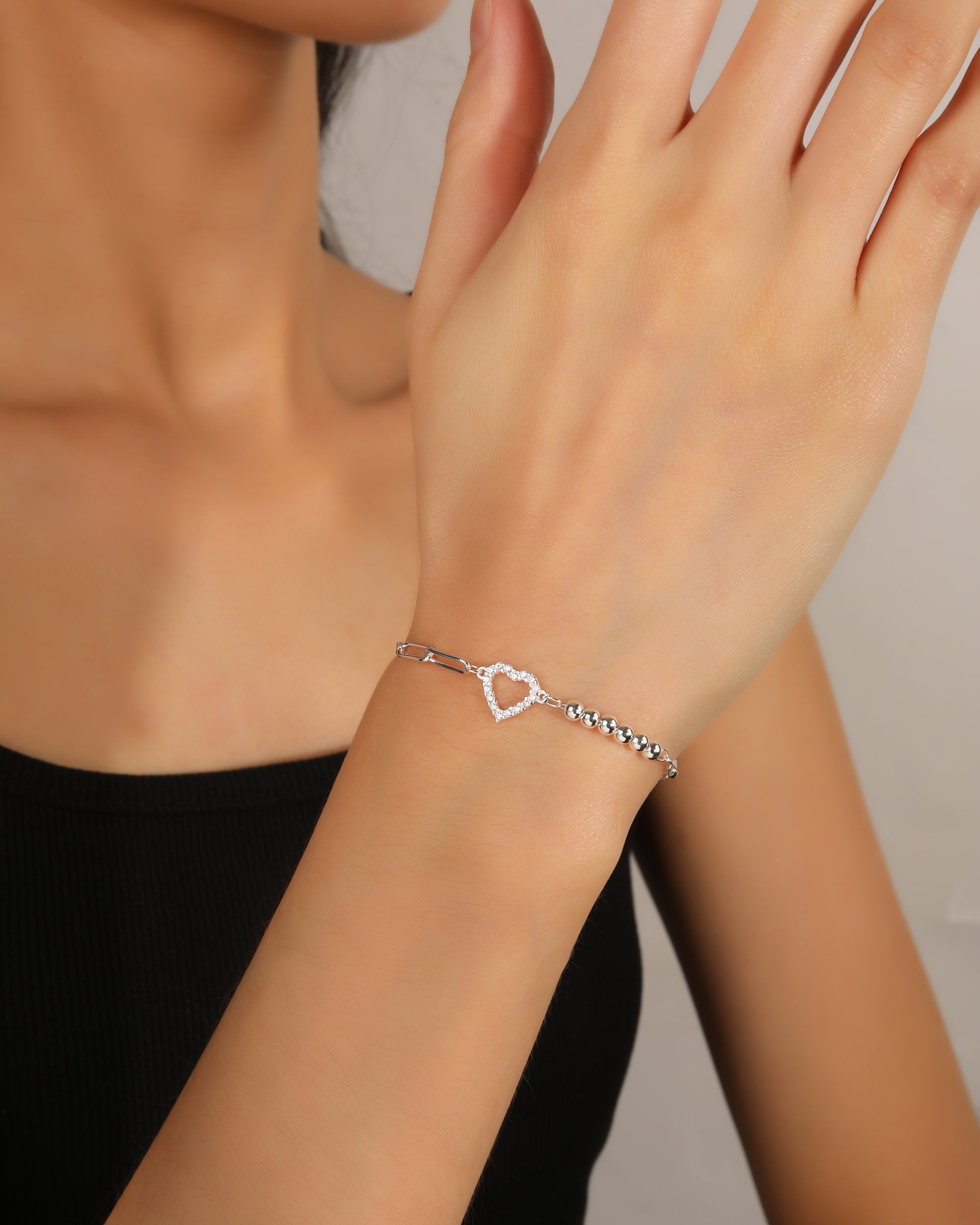 Pulsera mixta eslabon y balin de corazon con circonia blanca 17+3cm en plateado