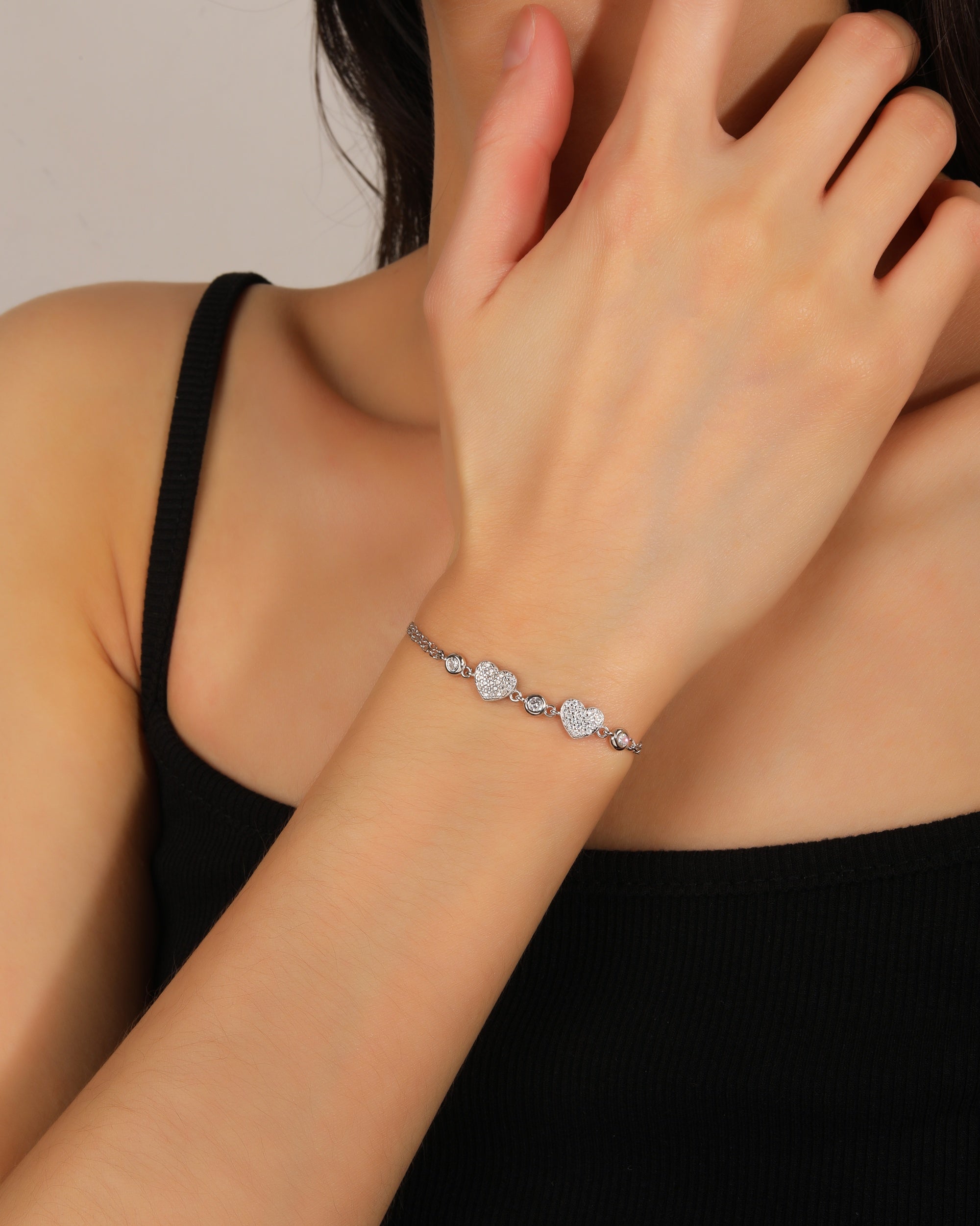 Pulsera doble de corazones con circonias biceladas 17+3cm en rodizado