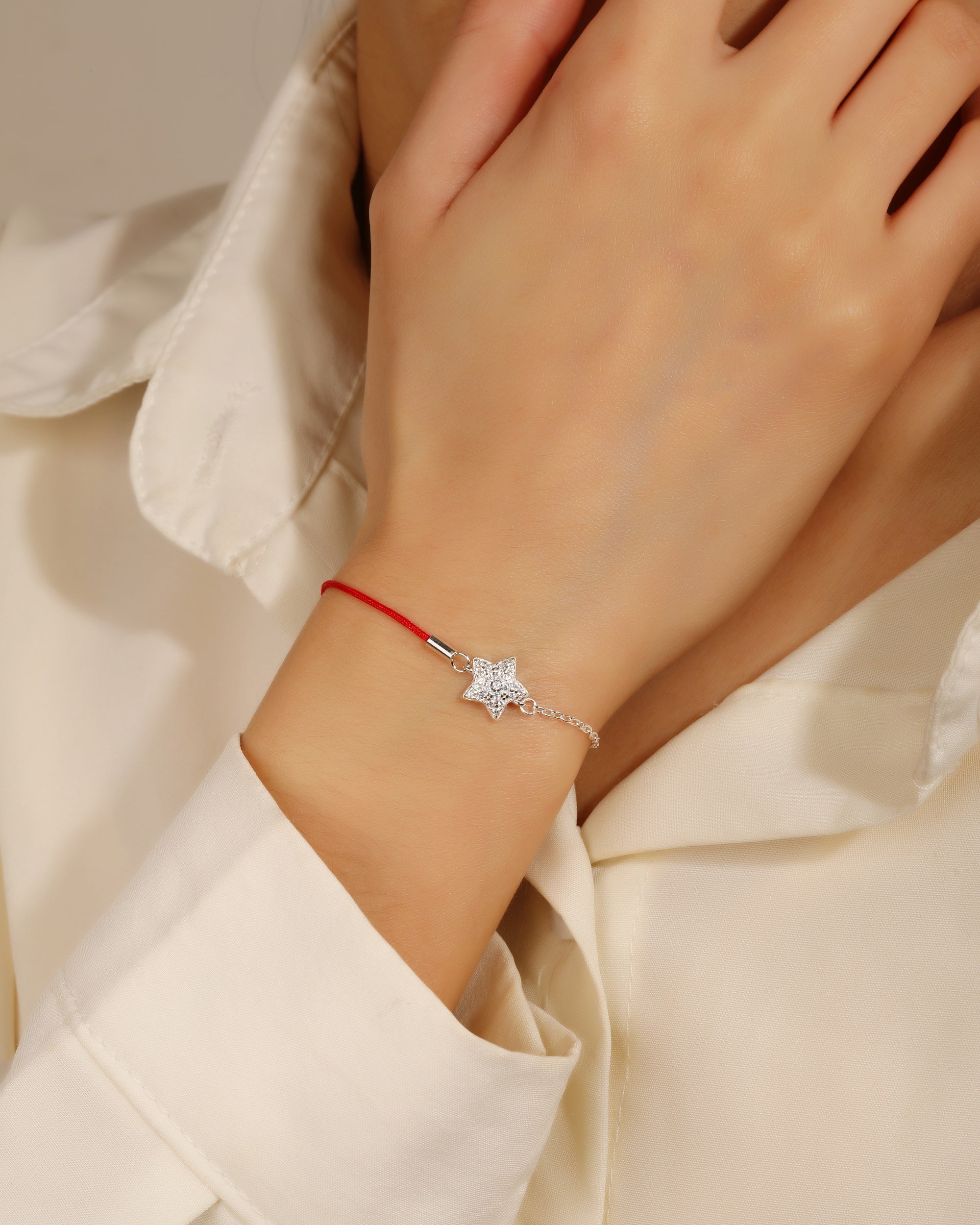 Pulsera sencilla de estrella con hilo 17+3cm en plateado