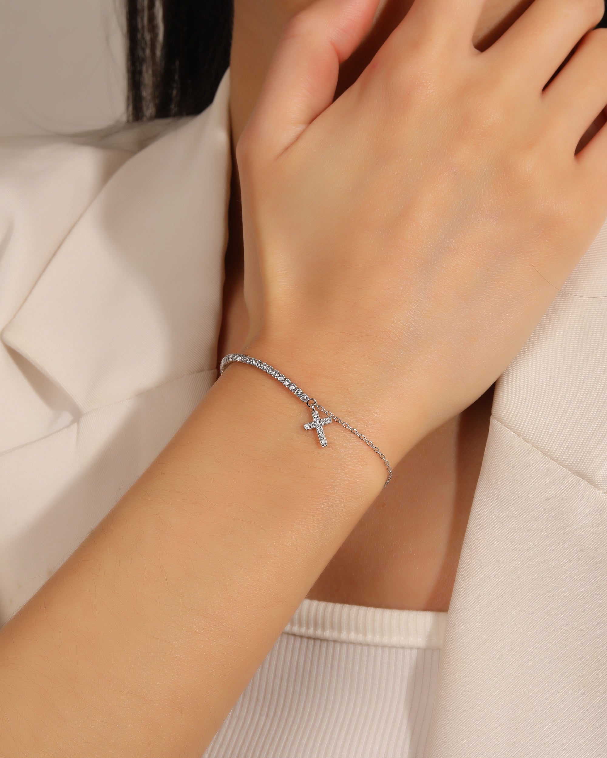 Pulsera tenis de 1.5mm con Cruz y circonia blanca 17+3cm en rodizado