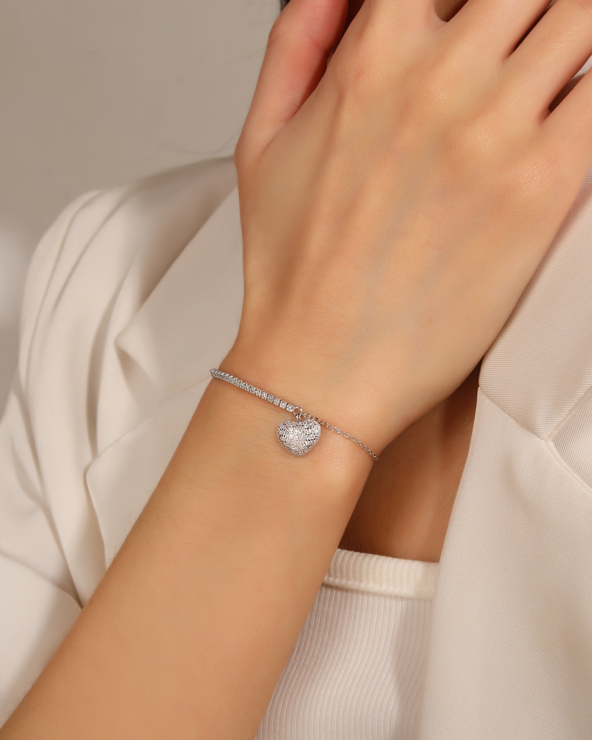 Pulsera tenis de 1.5mm con corazon y circonia blanca 17+3cm en rodizado