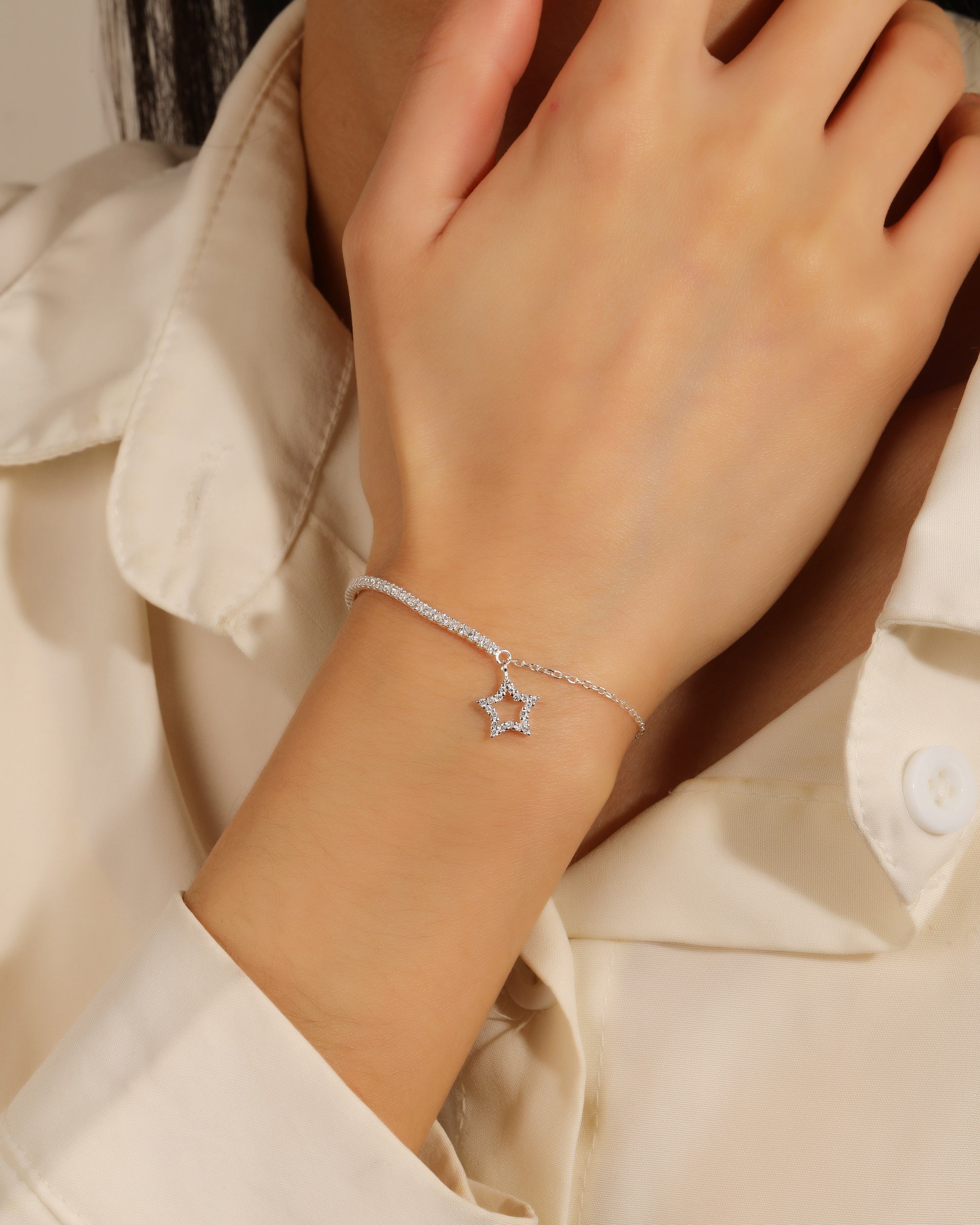 Pulsera tenis de 1.5mm con estrella y circonia blanca 17+3cm en plateado