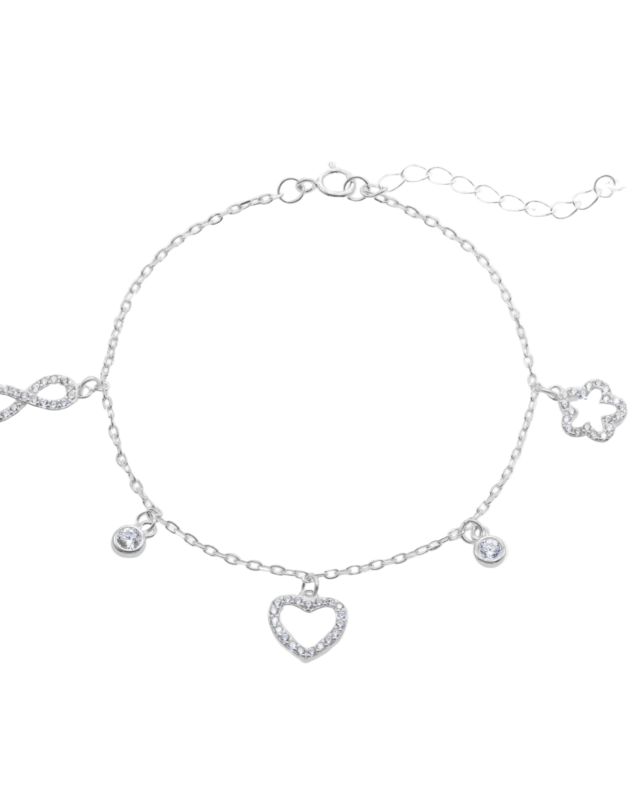 Pulsera con dijes varios con circonia blanca 17+3cm en plateado