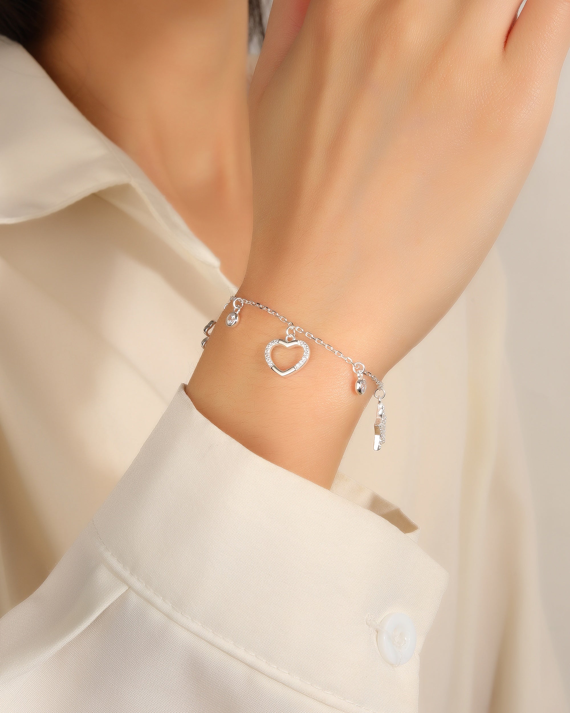 Pulsera de trebol corazon y estrella con circonia 17+3cm en plateado
