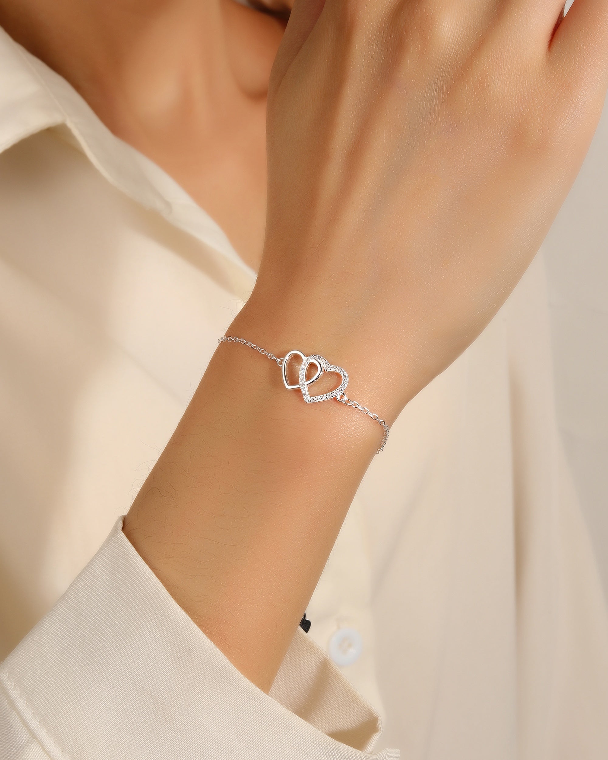 Pulsera sencilla de corazones con circonia blanca 17+3cm en plateado
