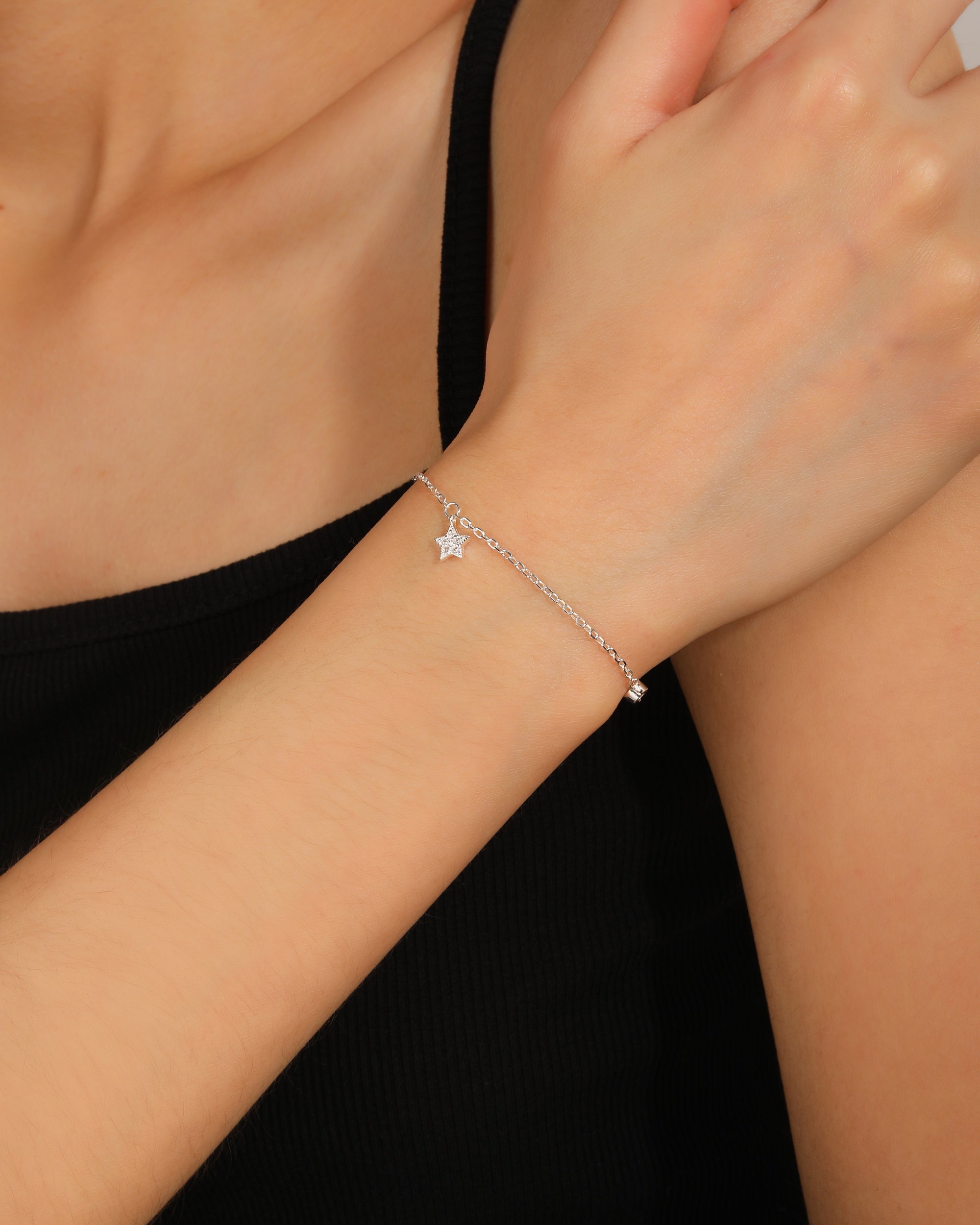 Pulsera sencilla de estrella con circonia blanca 17+3cm en plateado