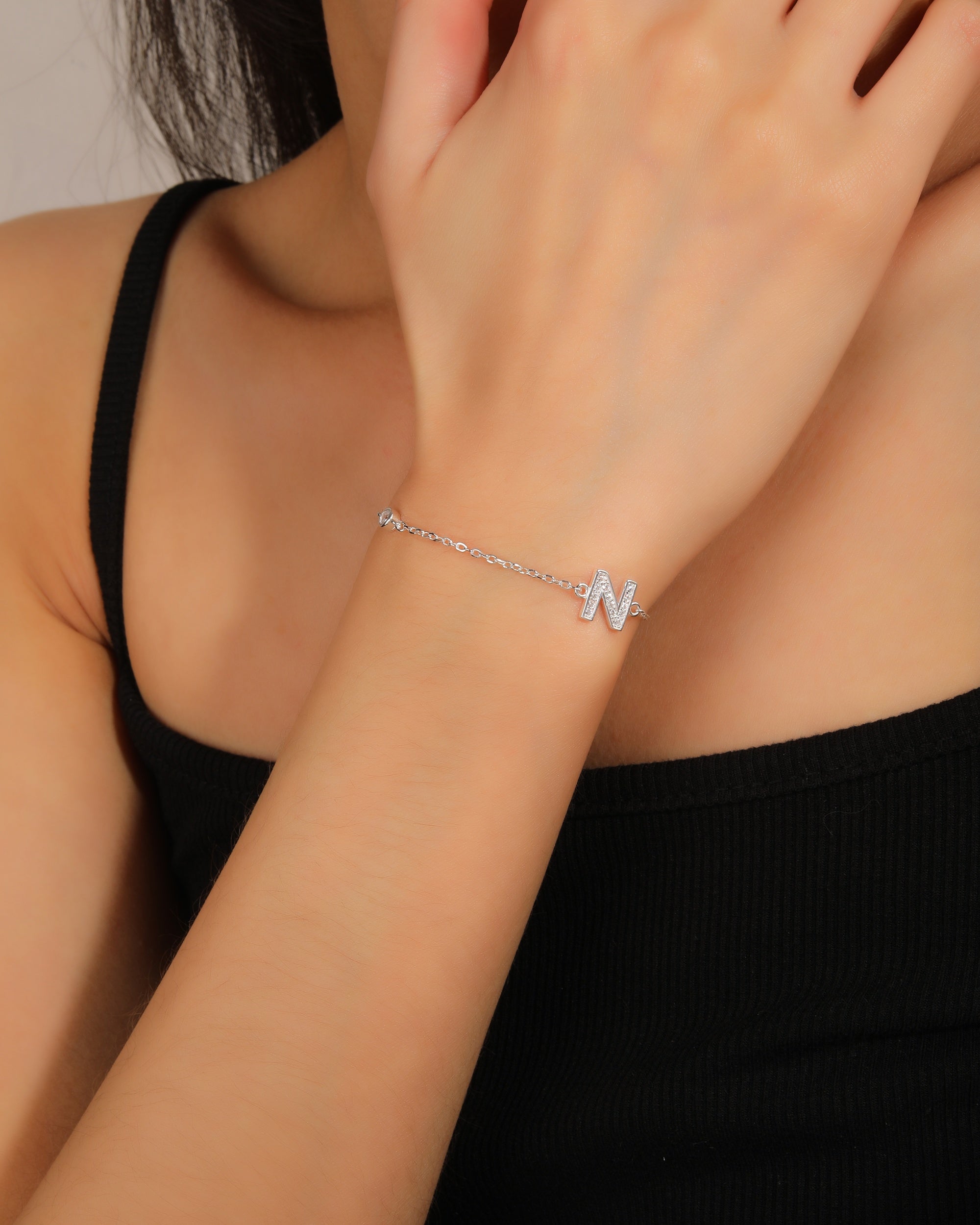 Pulsera de letra con circonia 17+3cm blanca en plateado